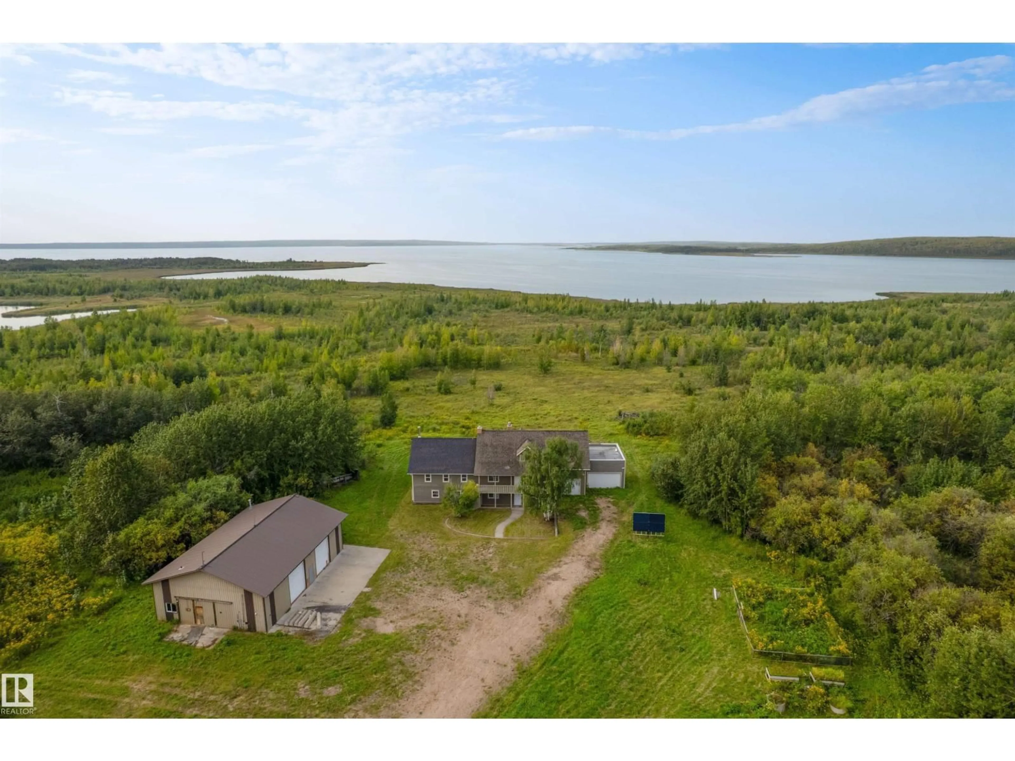 A pic from outside/outdoor area/front of a property/back of a property/a pic from drone, water/lake/river/ocean view for 45116 TOWNSHIP 593A RD, Rural Bonnyville M.D. Alberta T9N2J6