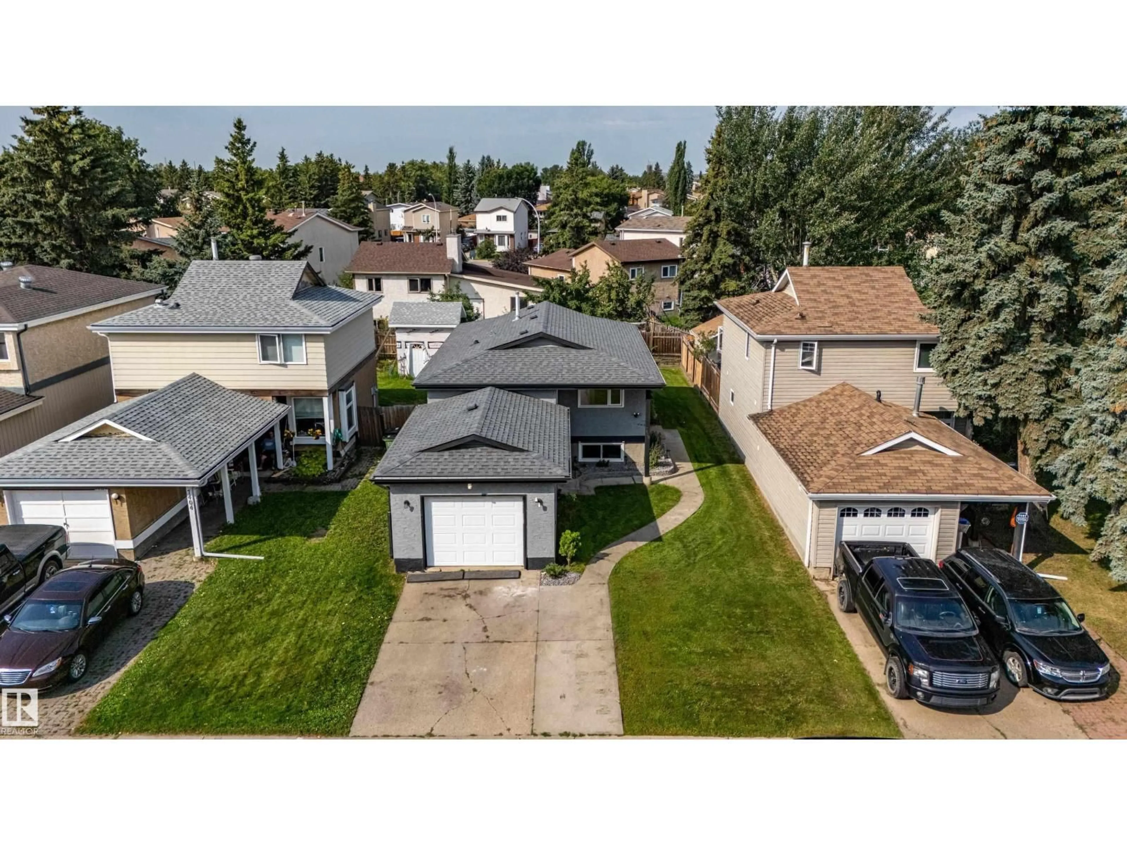 A pic from outside/outdoor area/front of a property/back of a property/a pic from drone, street for 7408 180 STREET, Edmonton Alberta T5T2K8