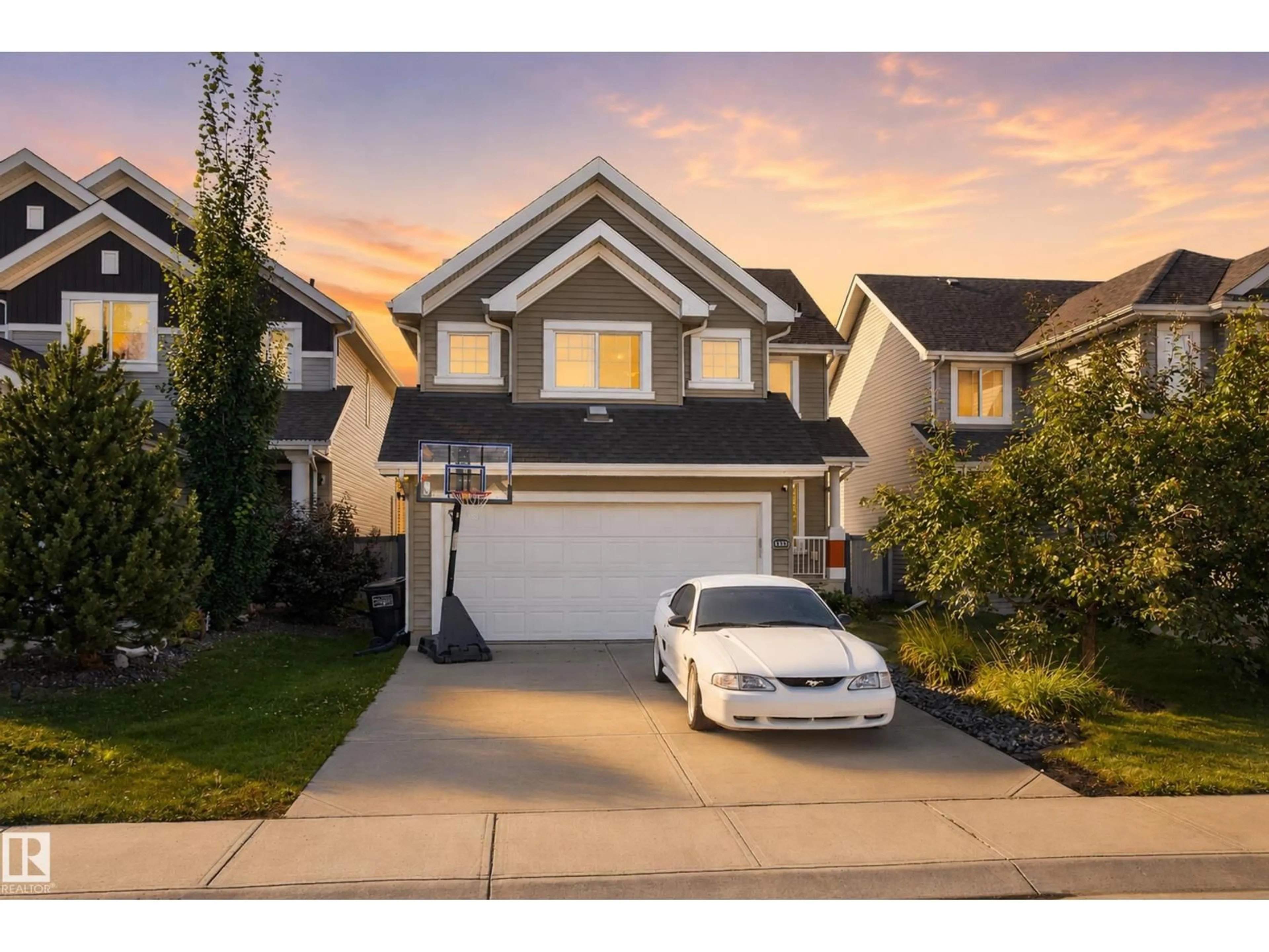 Home with vinyl exterior material, street for SW - 1332 72 ST, Edmonton Alberta T6X0H2