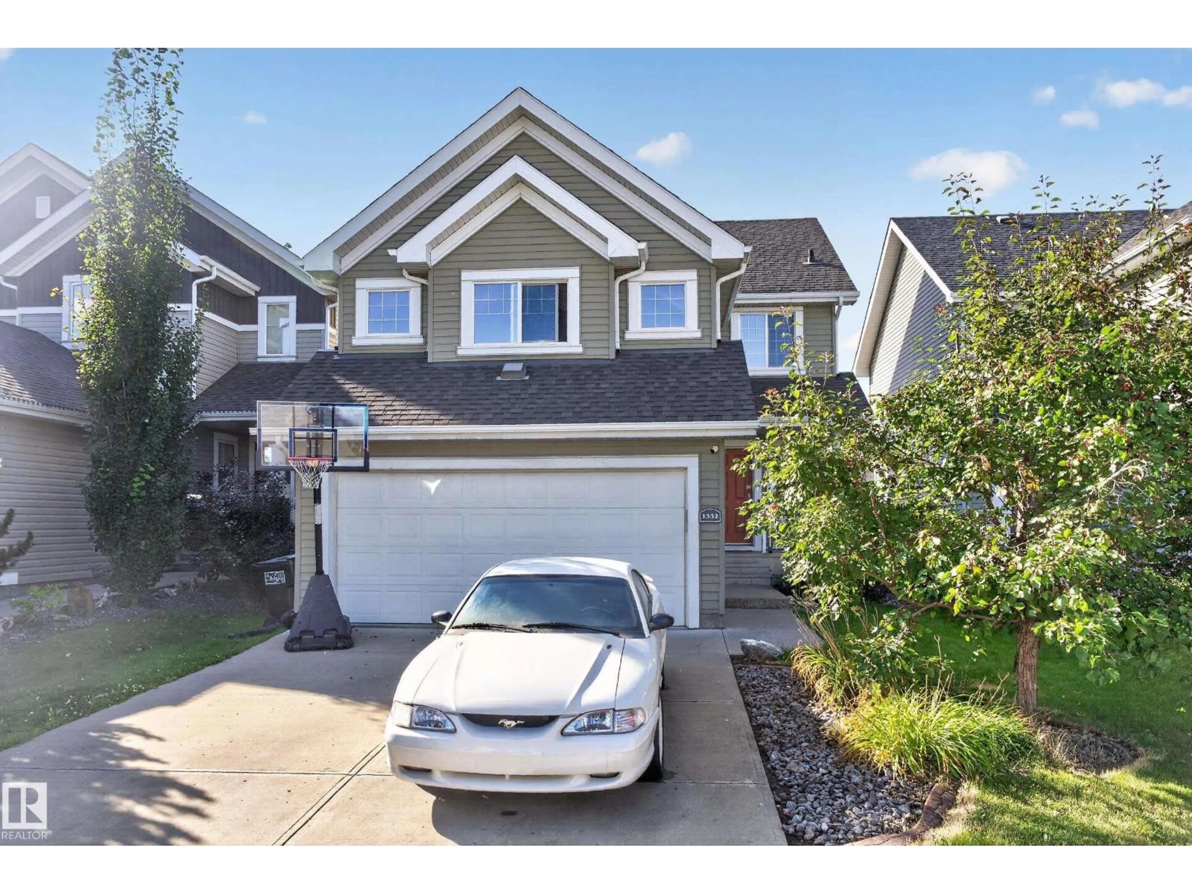Home with vinyl exterior material, street for SW - 1332 72 ST, Edmonton Alberta T6X0H2