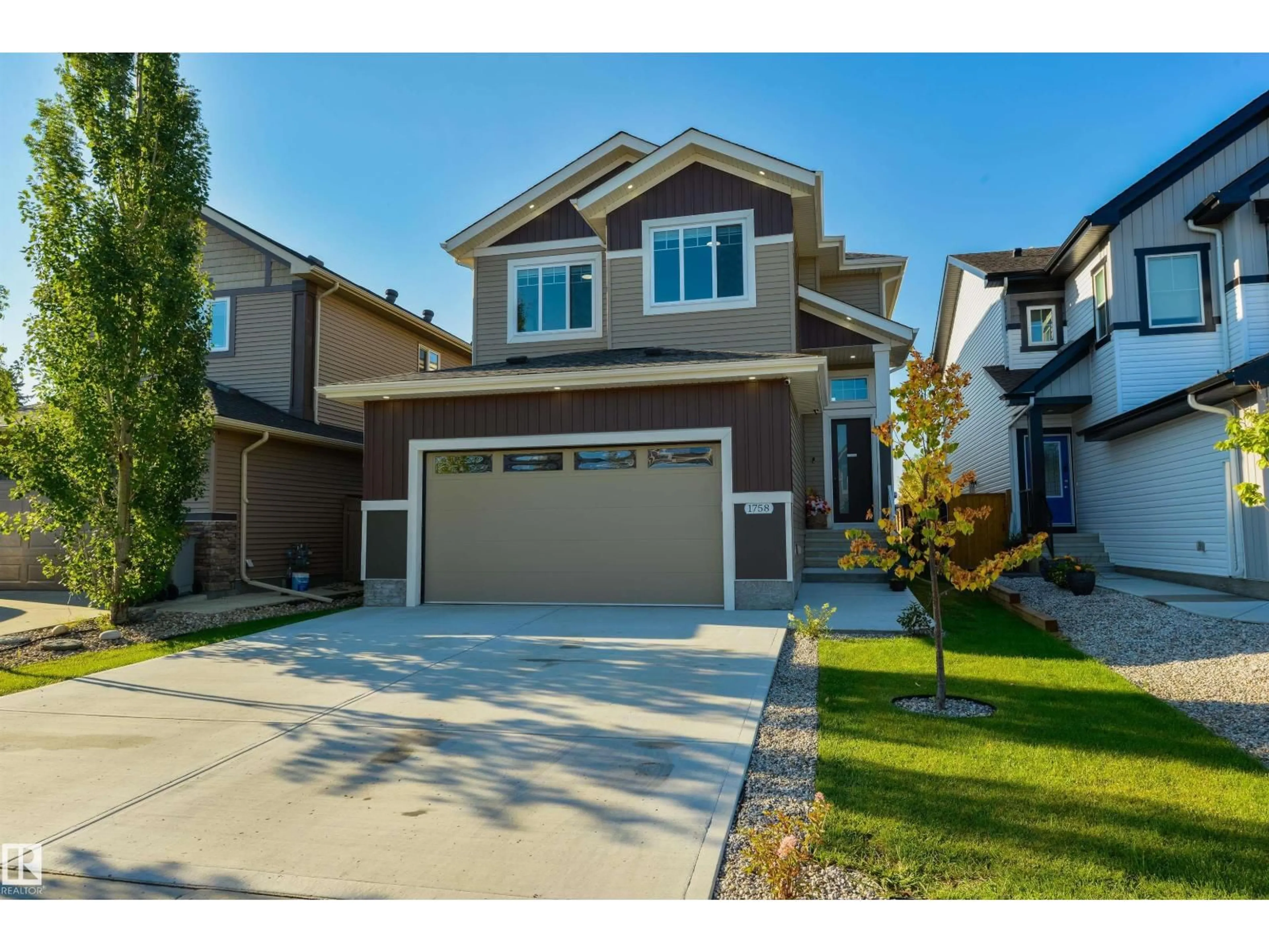 Home with vinyl exterior material, street for 1758 WESTERRA LO, Stony Plain Alberta T7Z0K9