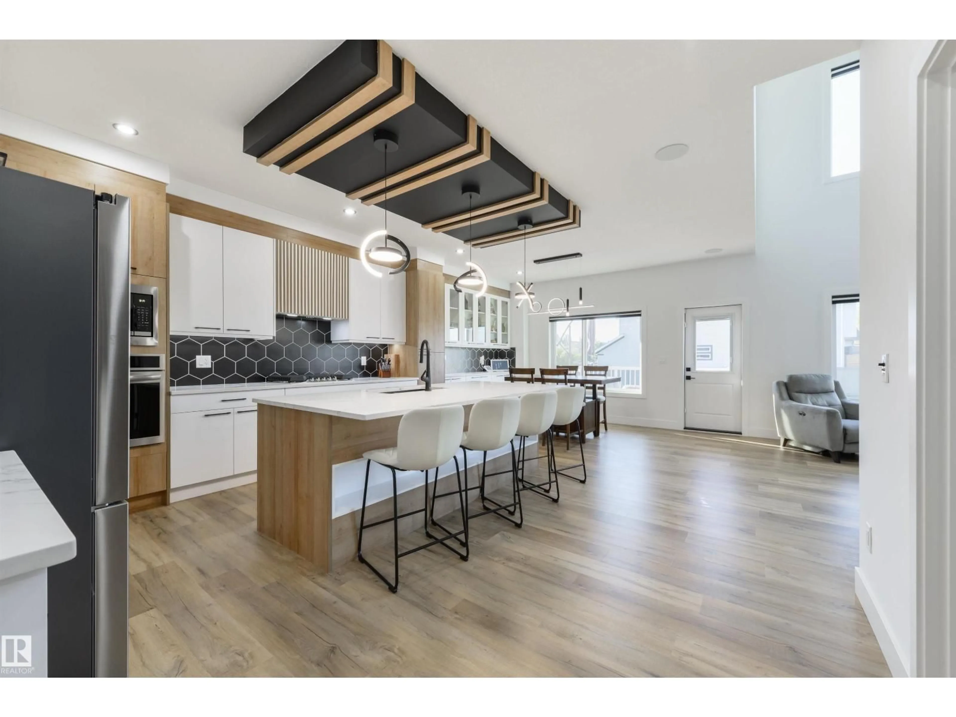 Open concept kitchen, wood/laminate floor for 1758 WESTERRA LO, Stony Plain Alberta T7Z0K9