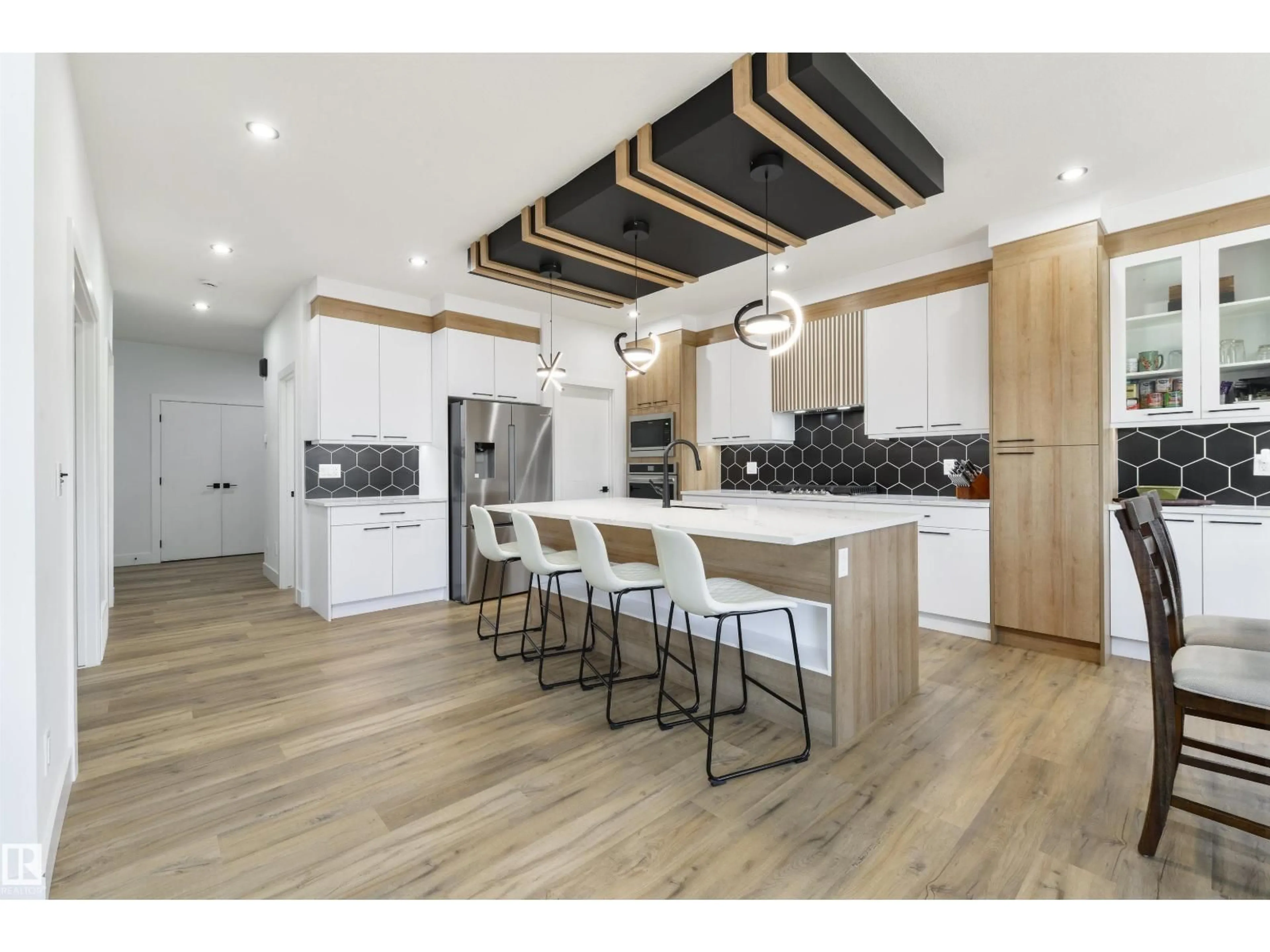 Open concept kitchen, wood/laminate floor for 1758 WESTERRA LO, Stony Plain Alberta T7Z0K9
