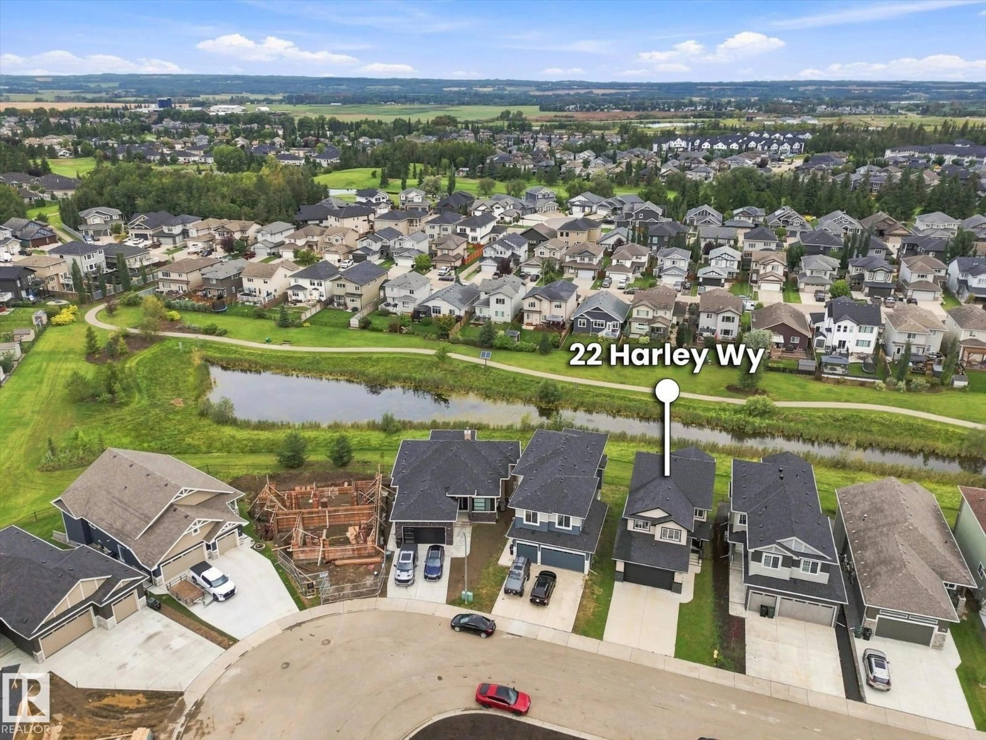A pic from outside/outdoor area/front of a property/back of a property/a pic from drone, water/lake/river/ocean view for 22 HARLEY WY, Spruce Grove Alberta T7X0X4