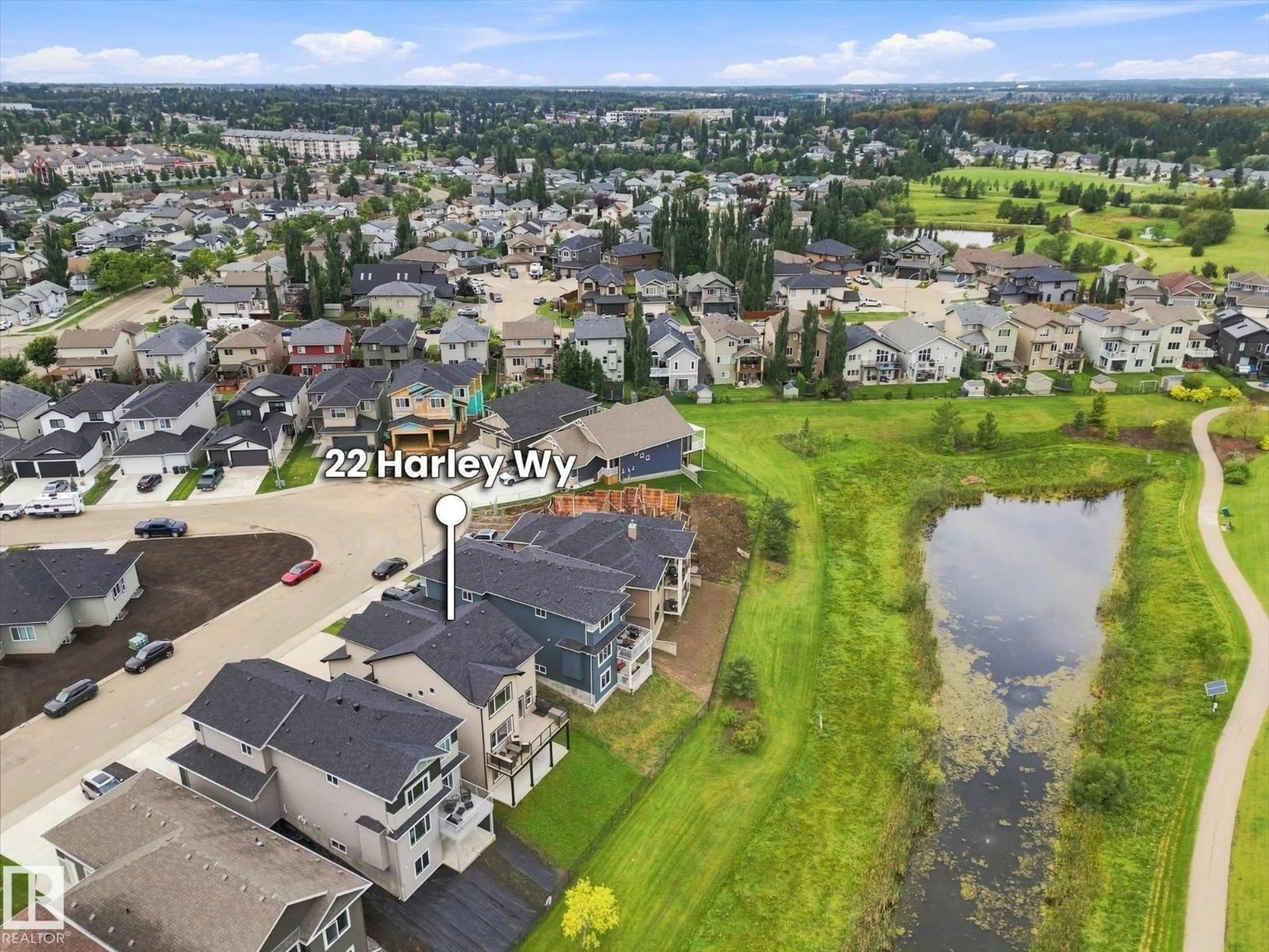 A pic from outside/outdoor area/front of a property/back of a property/a pic from drone, water/lake/river/ocean view for 22 HARLEY WY, Spruce Grove Alberta T7X0X4