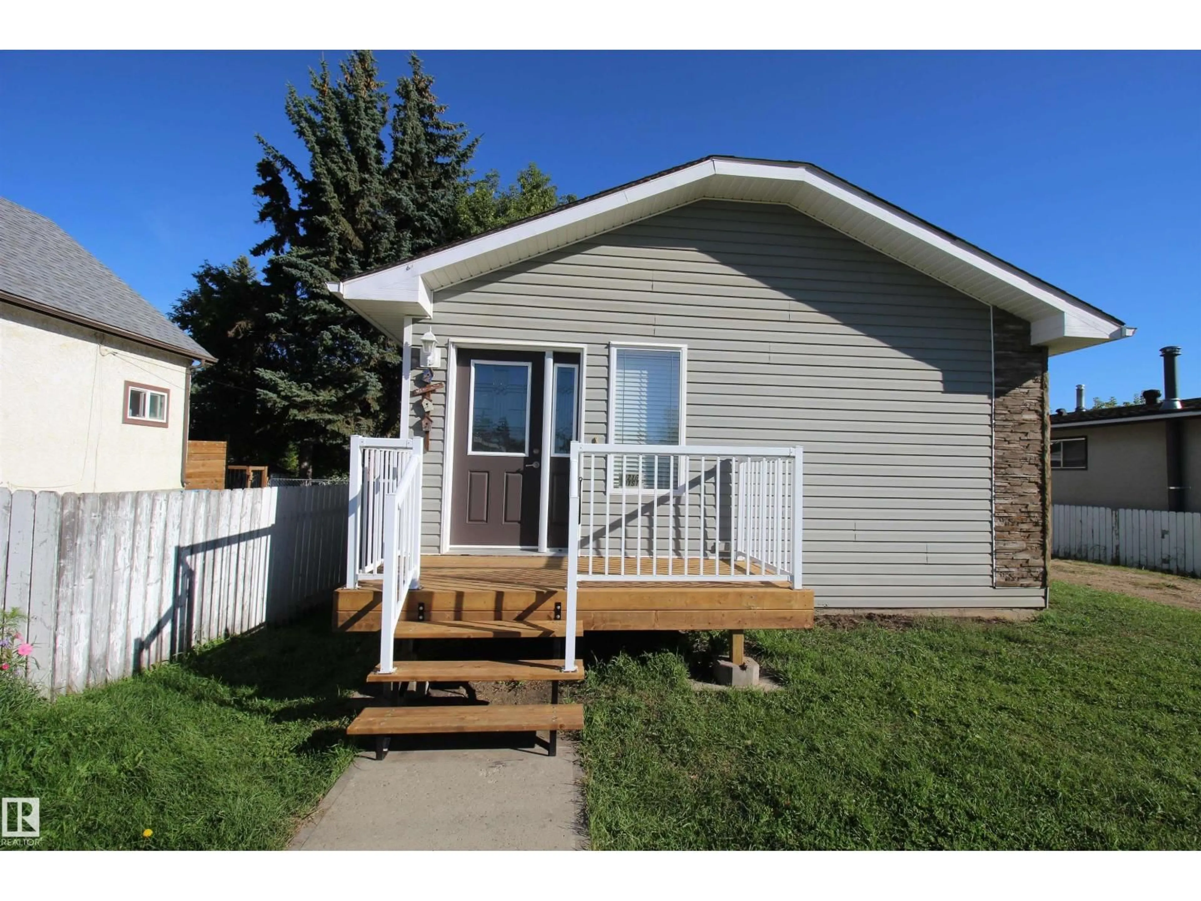 Home with vinyl exterior material, street for 10216 101 ST, Westlock Alberta T7P1X9