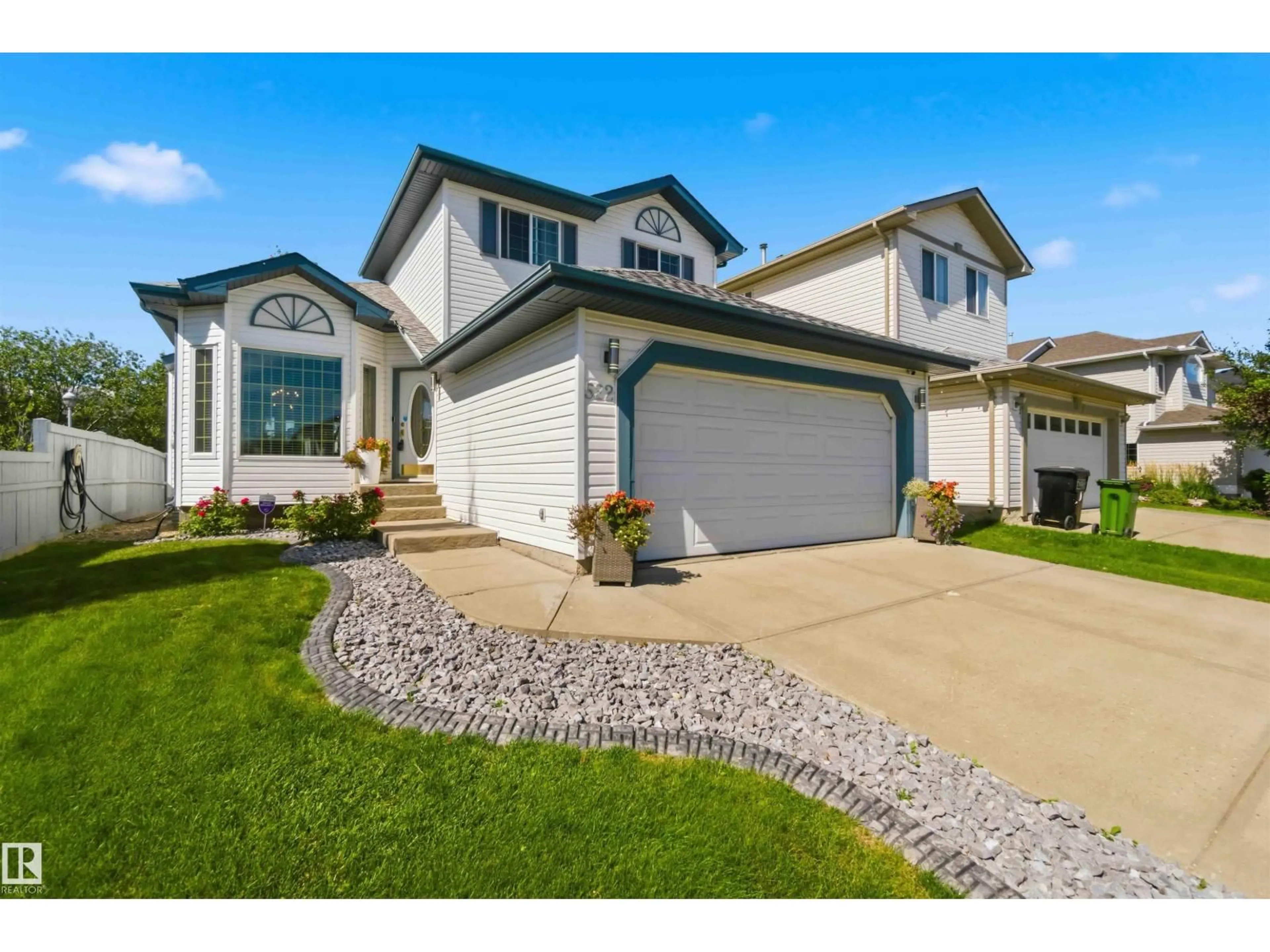 Home with vinyl exterior material, street for 522 KLARVATTEN LAKE WD, Edmonton Alberta T5Z3E4