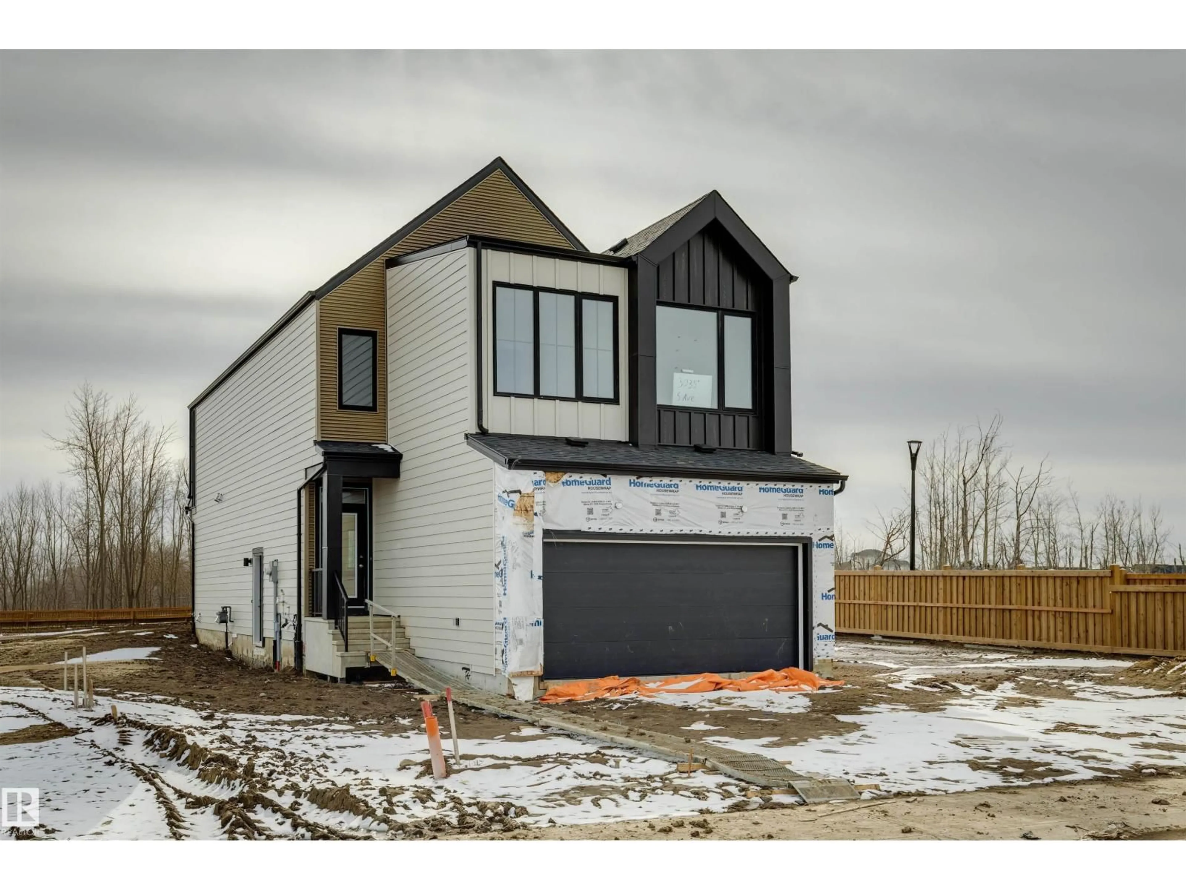 Home with brick exterior material, street for 3035 5 AV, Edmonton Alberta T6X1A5
