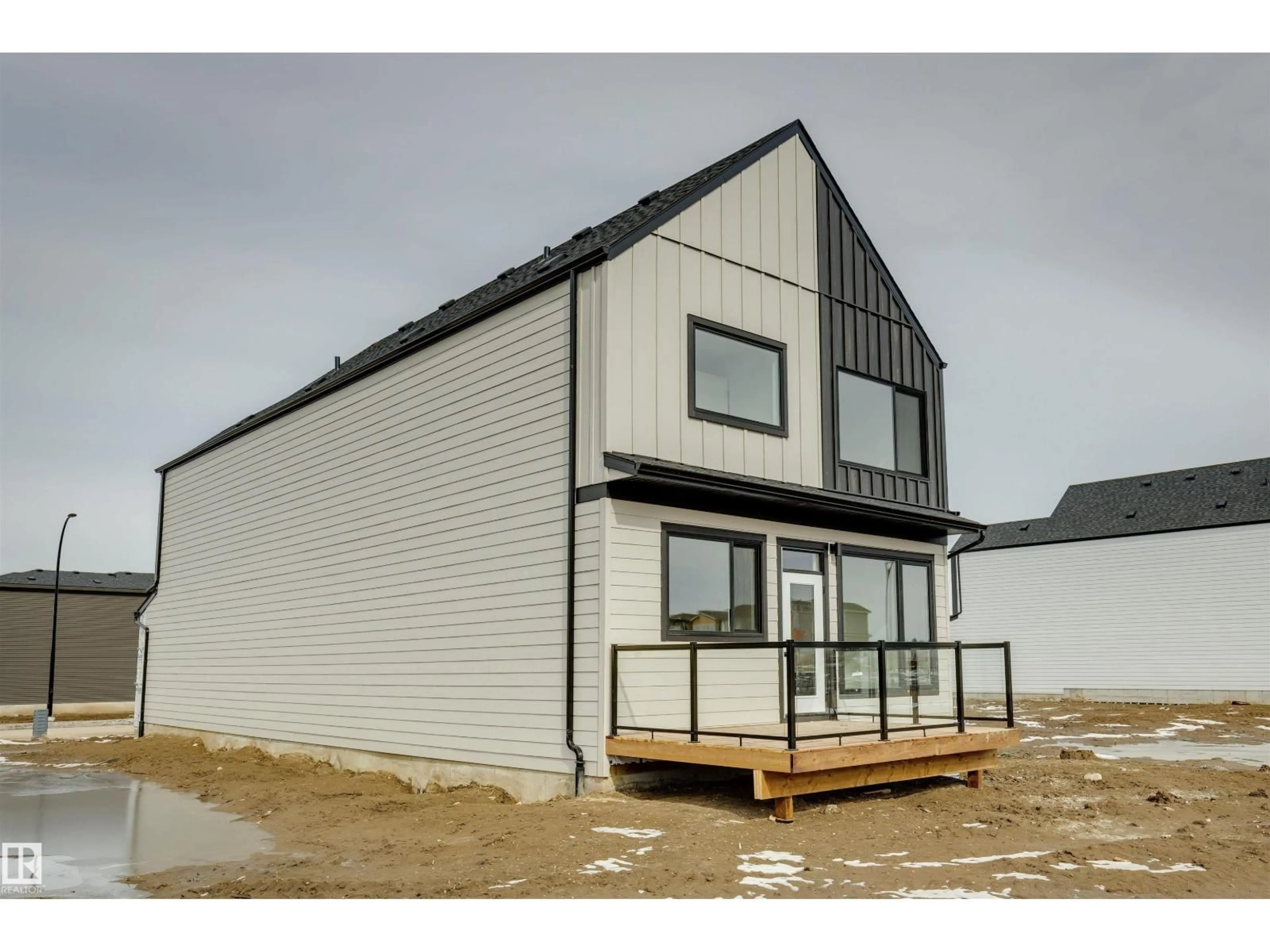 Home with vinyl exterior material, building for 3035 5 AV, Edmonton Alberta T6X1A5