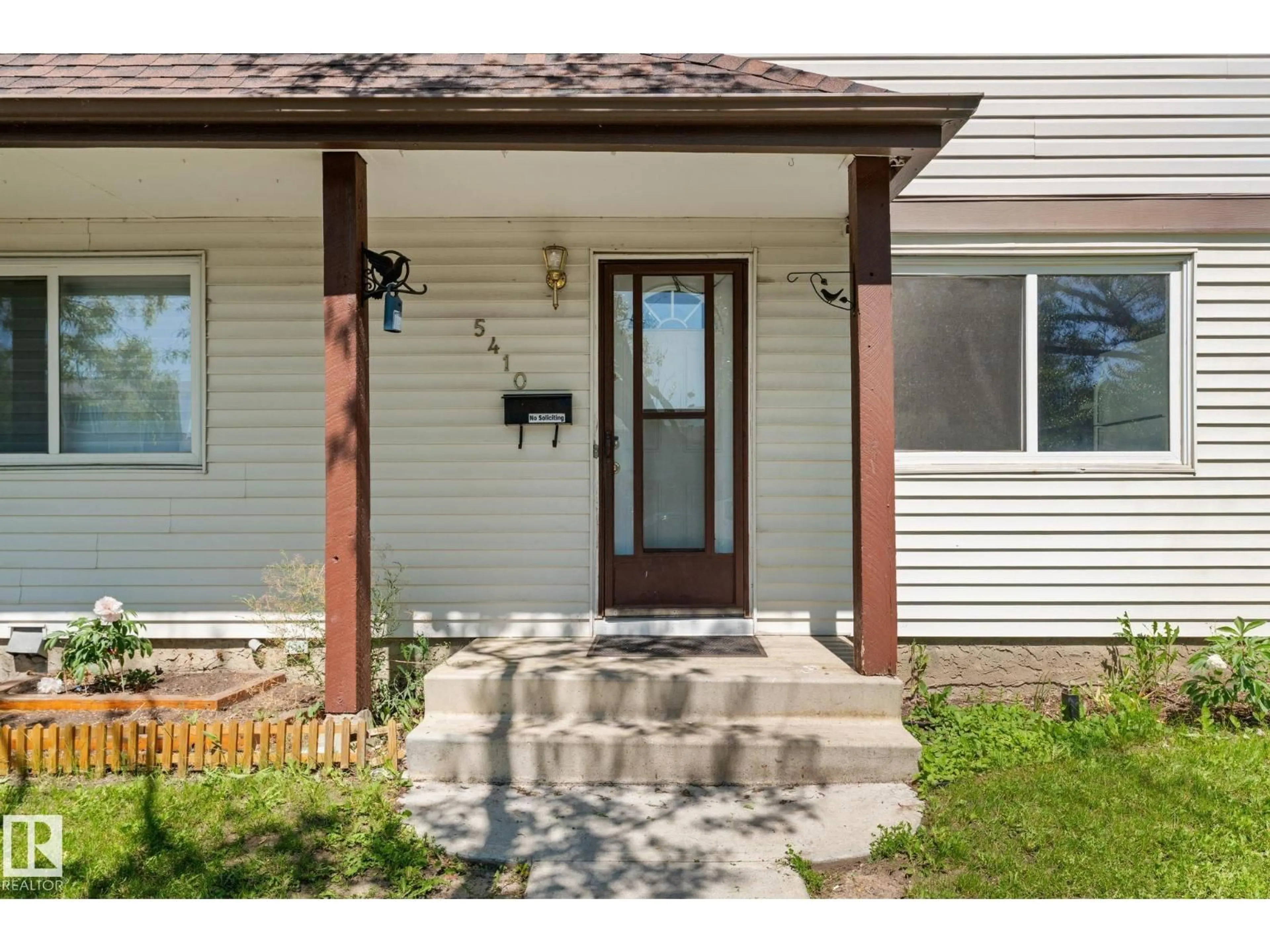 Home with brick exterior material, street for NW - 5410 146 AV, Edmonton Alberta T5A4L6