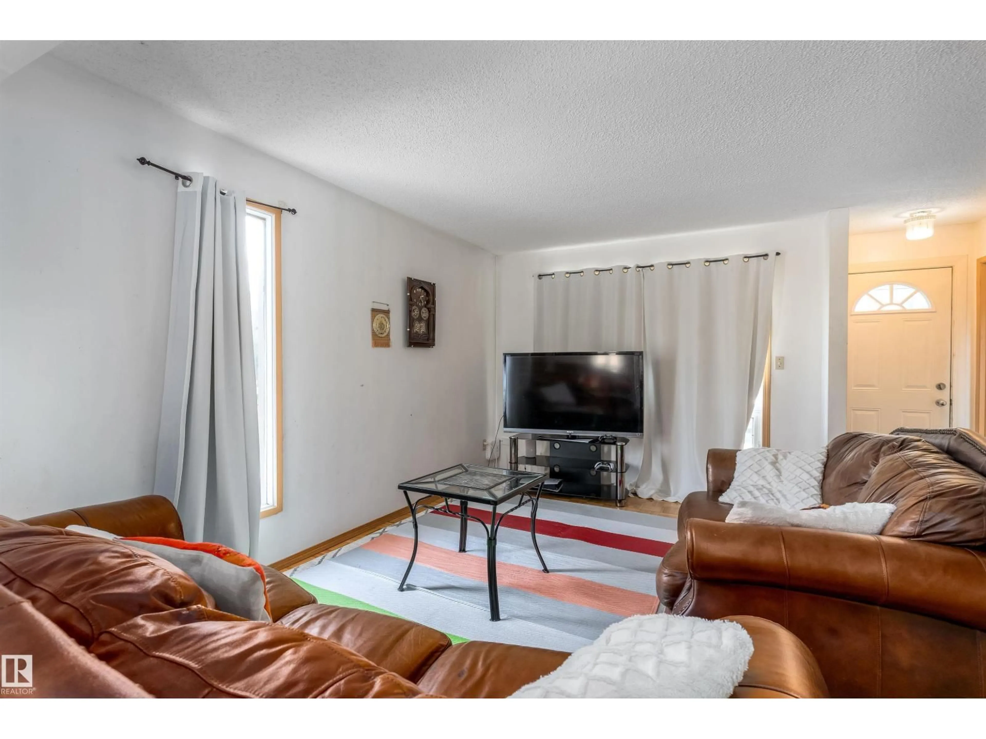 Living room with furniture, unknown for NW - 14737 25 ST, Edmonton Alberta T5Y2E8