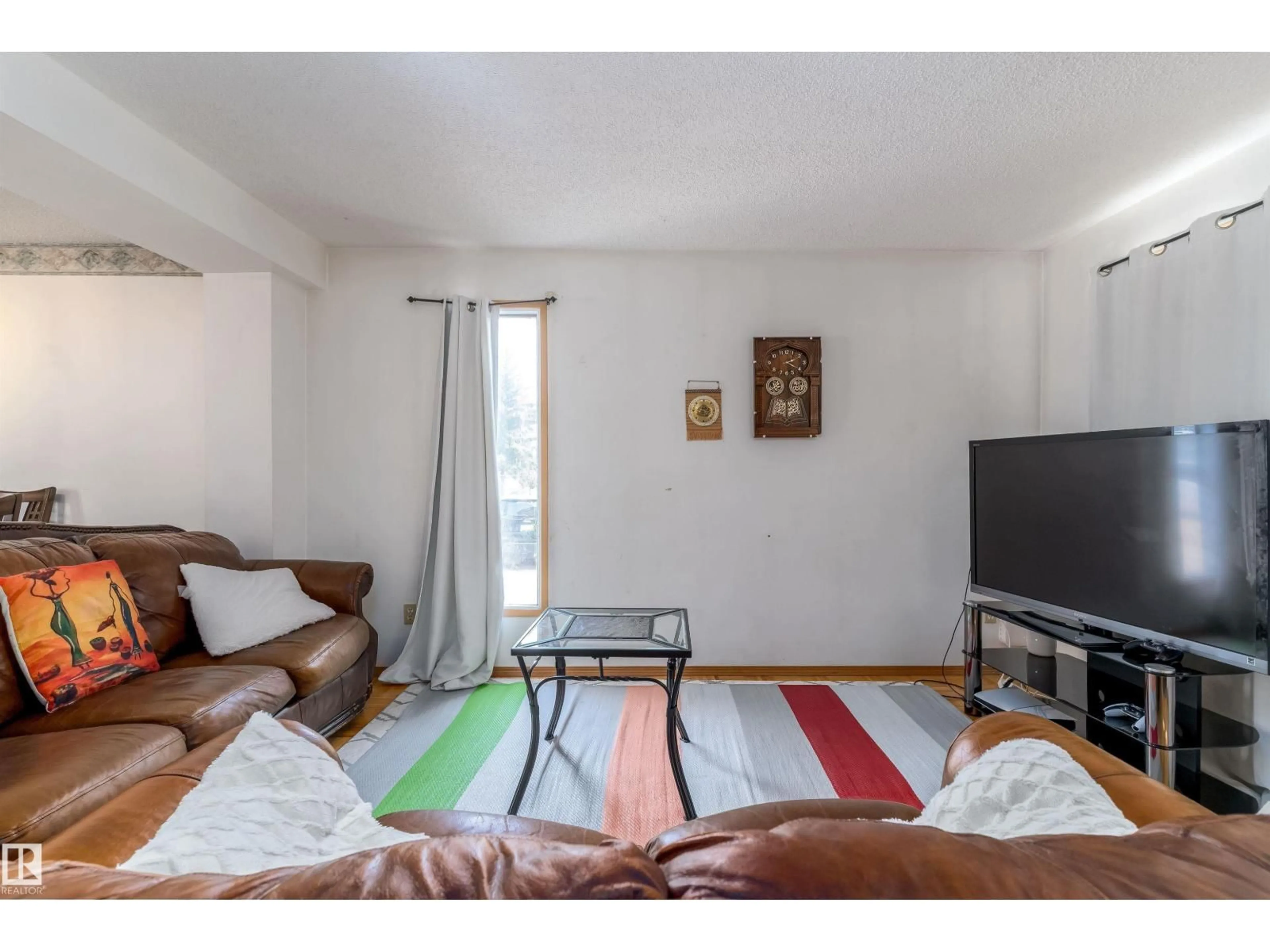 Living room with furniture, unknown for NW - 14737 25 ST, Edmonton Alberta T5Y2E8
