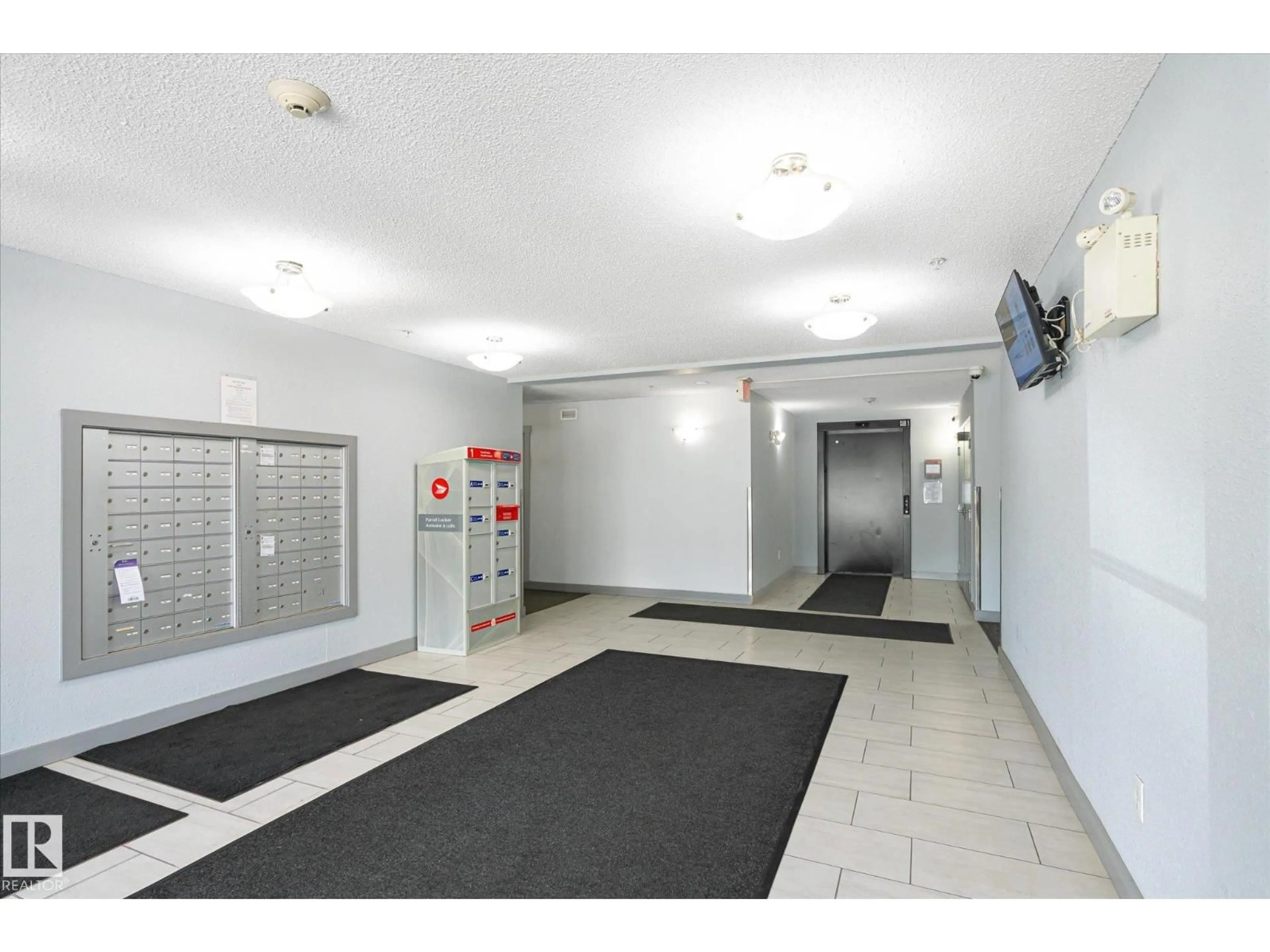 Indoor foyer for #409 - 11816 22 AV, Edmonton Alberta T6W2A2