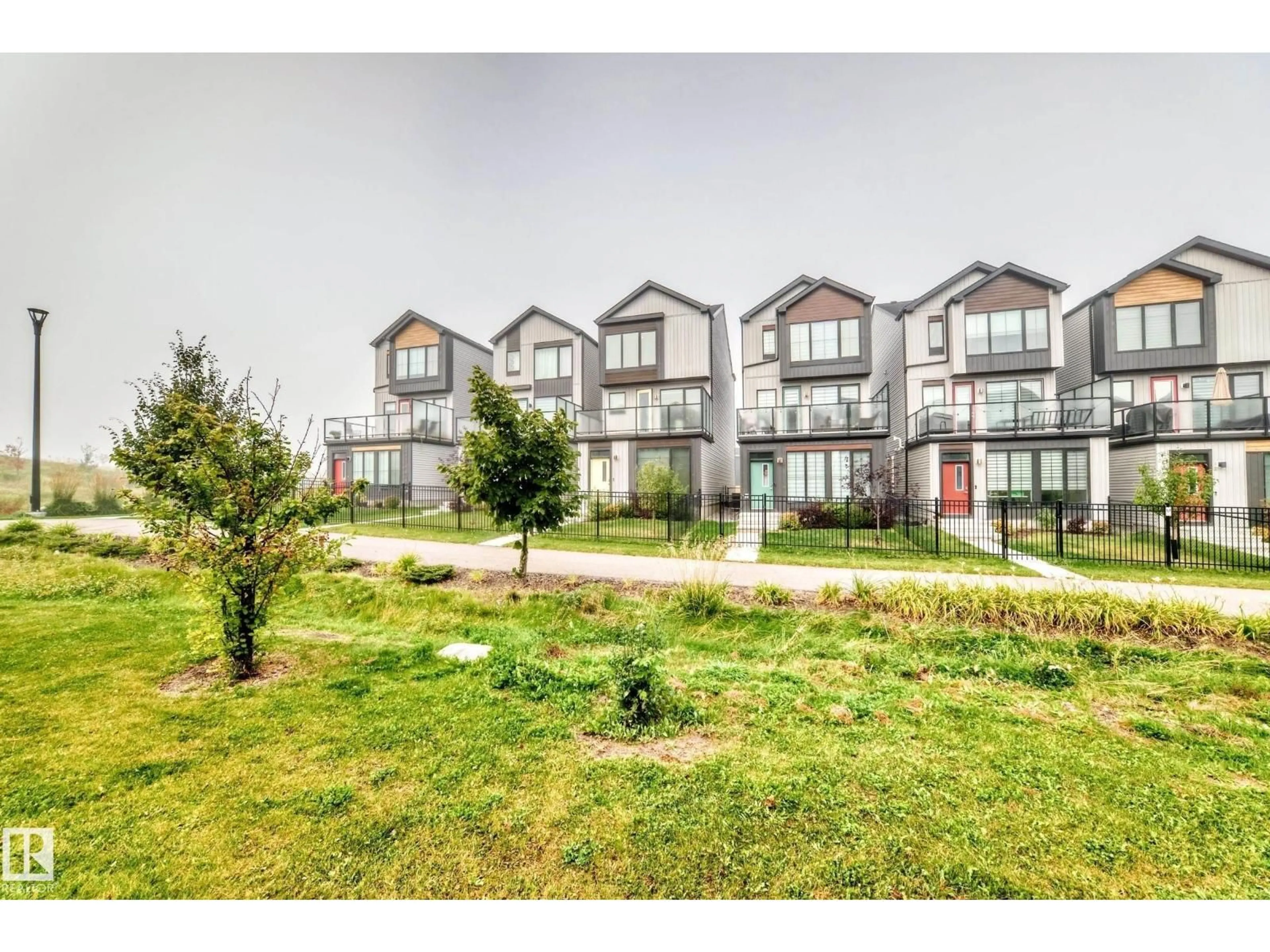 A pic from outside/outdoor area/front of a property/back of a property/a pic from drone, unknown for SW - 479 39 ST, Edmonton Alberta T6X2X9
