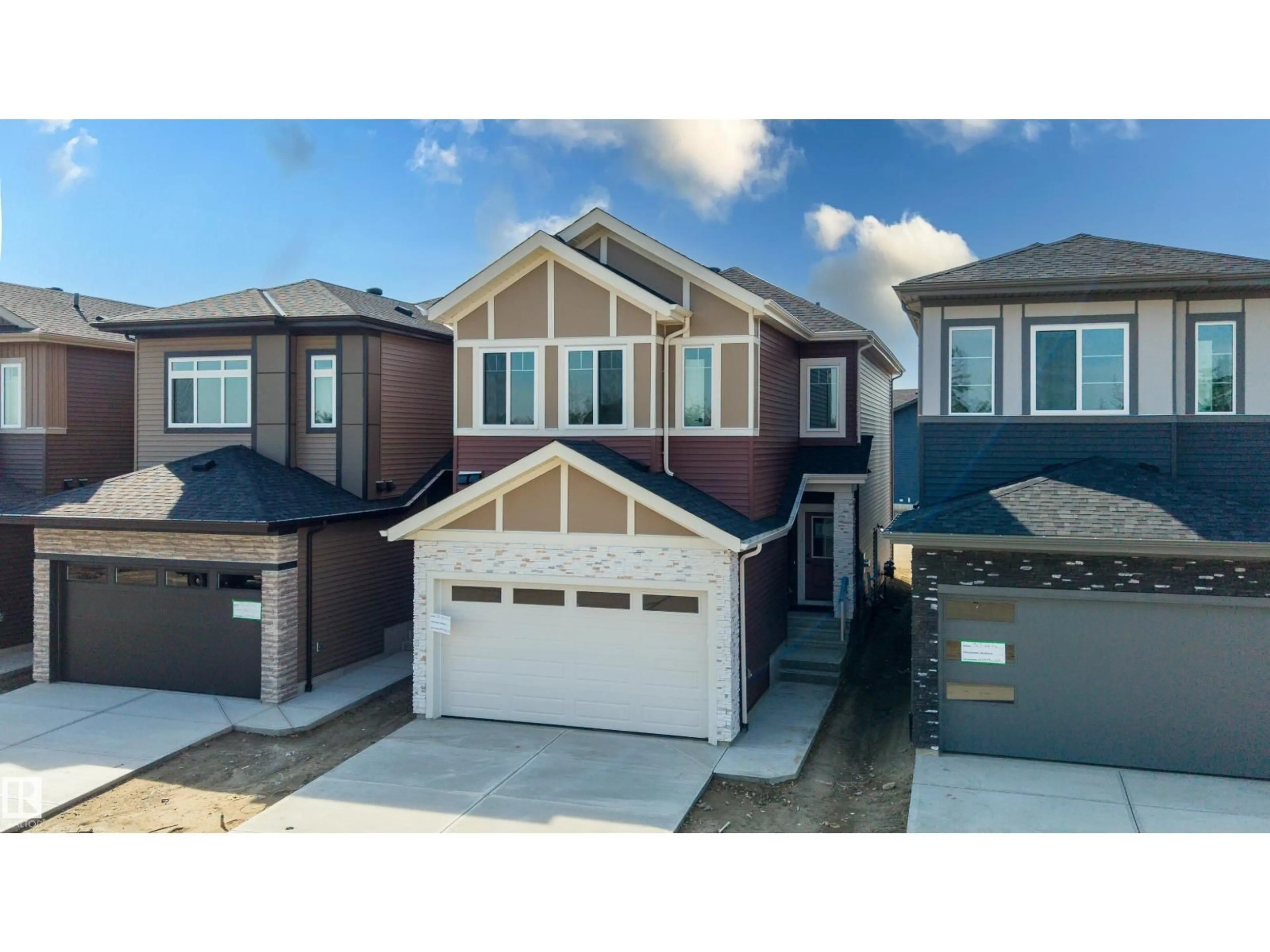 Home with vinyl exterior material, street for NE - 731 158 AV, Edmonton Alberta T5Y4M9