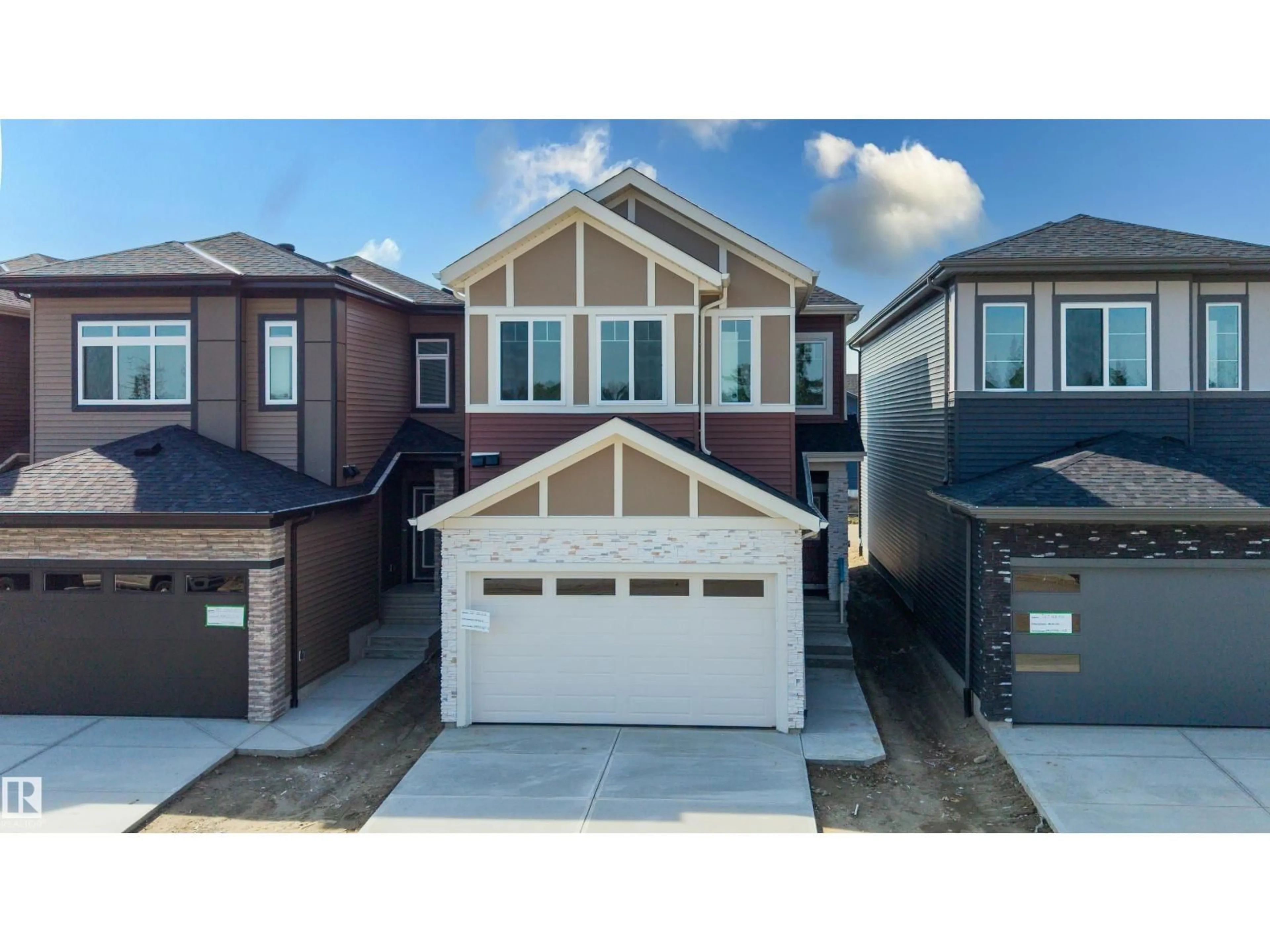 Home with vinyl exterior material, street for NE - 731 158 AV, Edmonton Alberta T5Y4M9