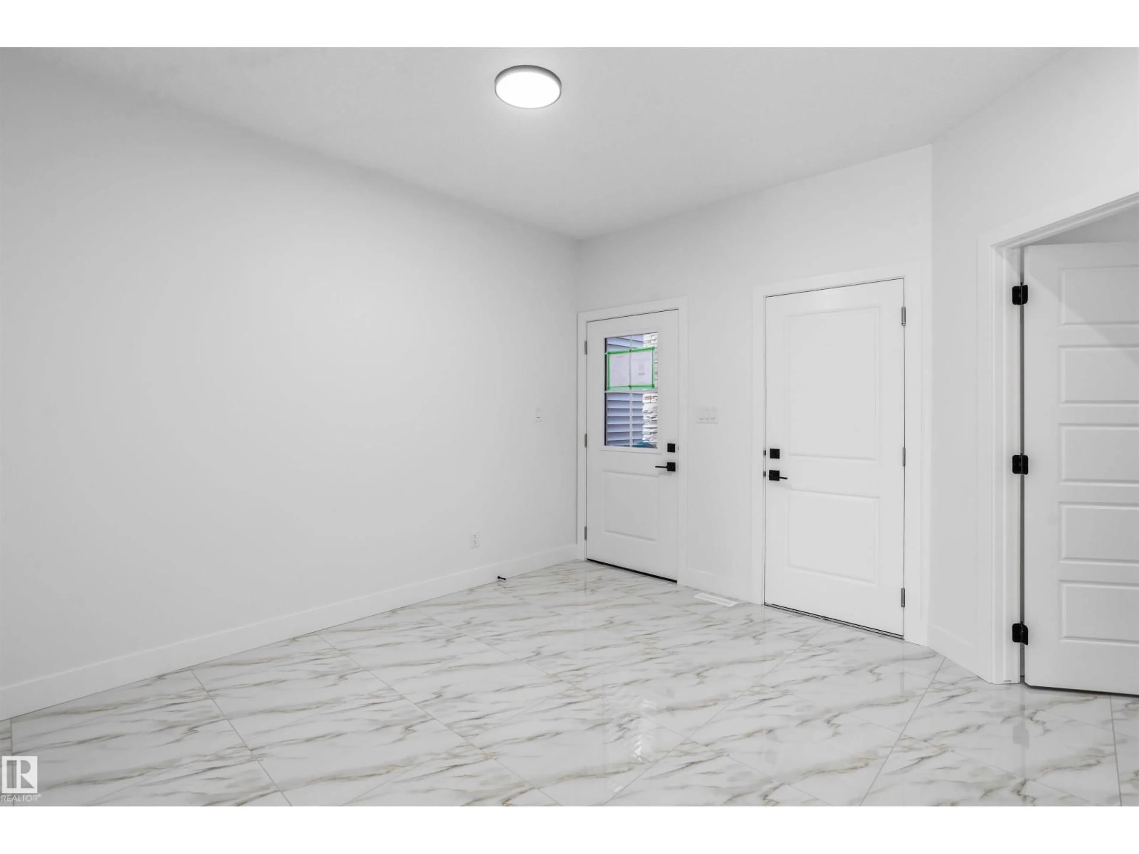 Indoor entryway for NE - 731 158 AV, Edmonton Alberta T5Y4M9