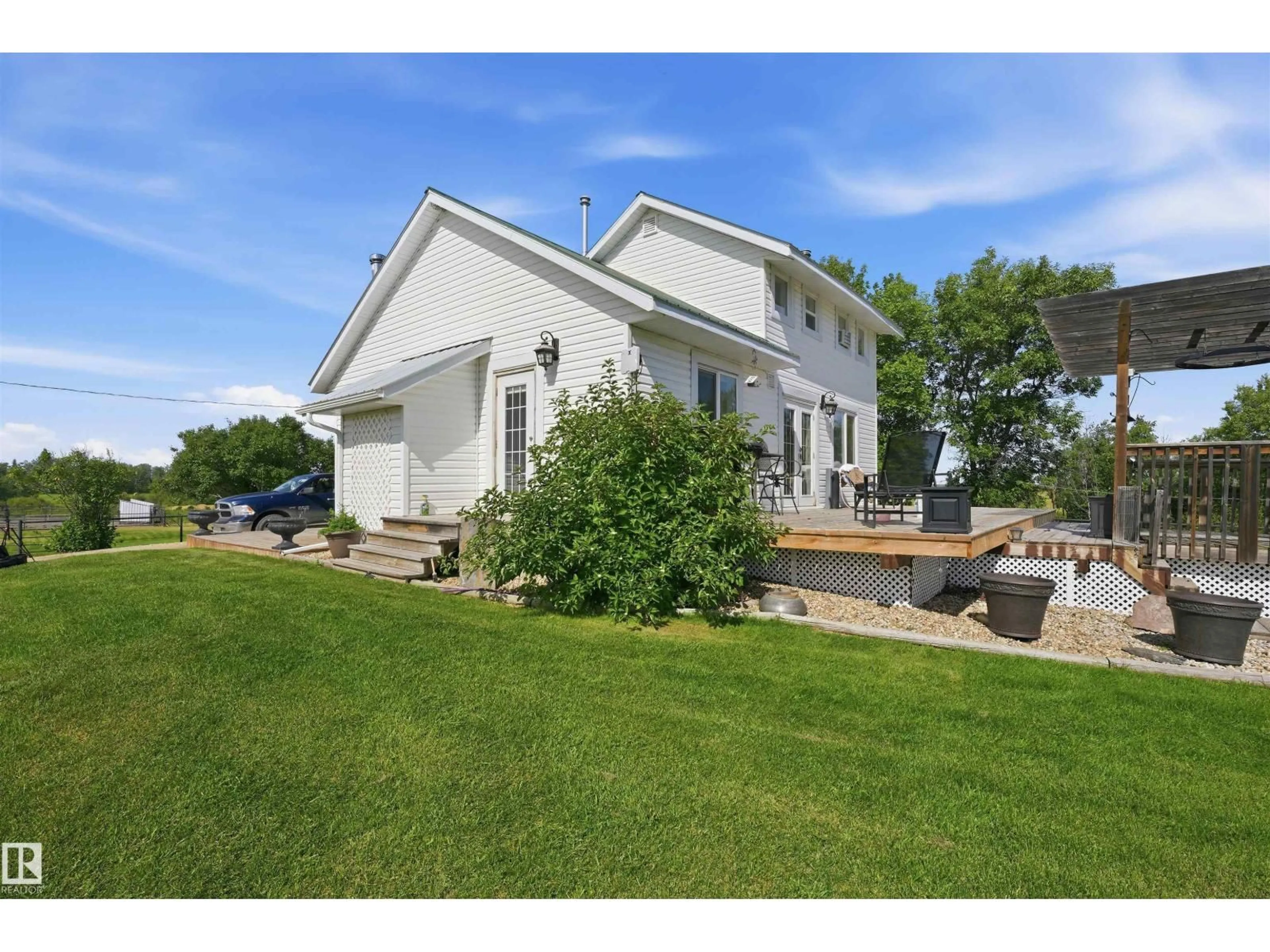 A pic from outside/outdoor area/front of a property/back of a property/a pic from drone, unknown for 56502 RGE ROAD 33, Rural Lac Ste. Anne County Alberta T0E1V0