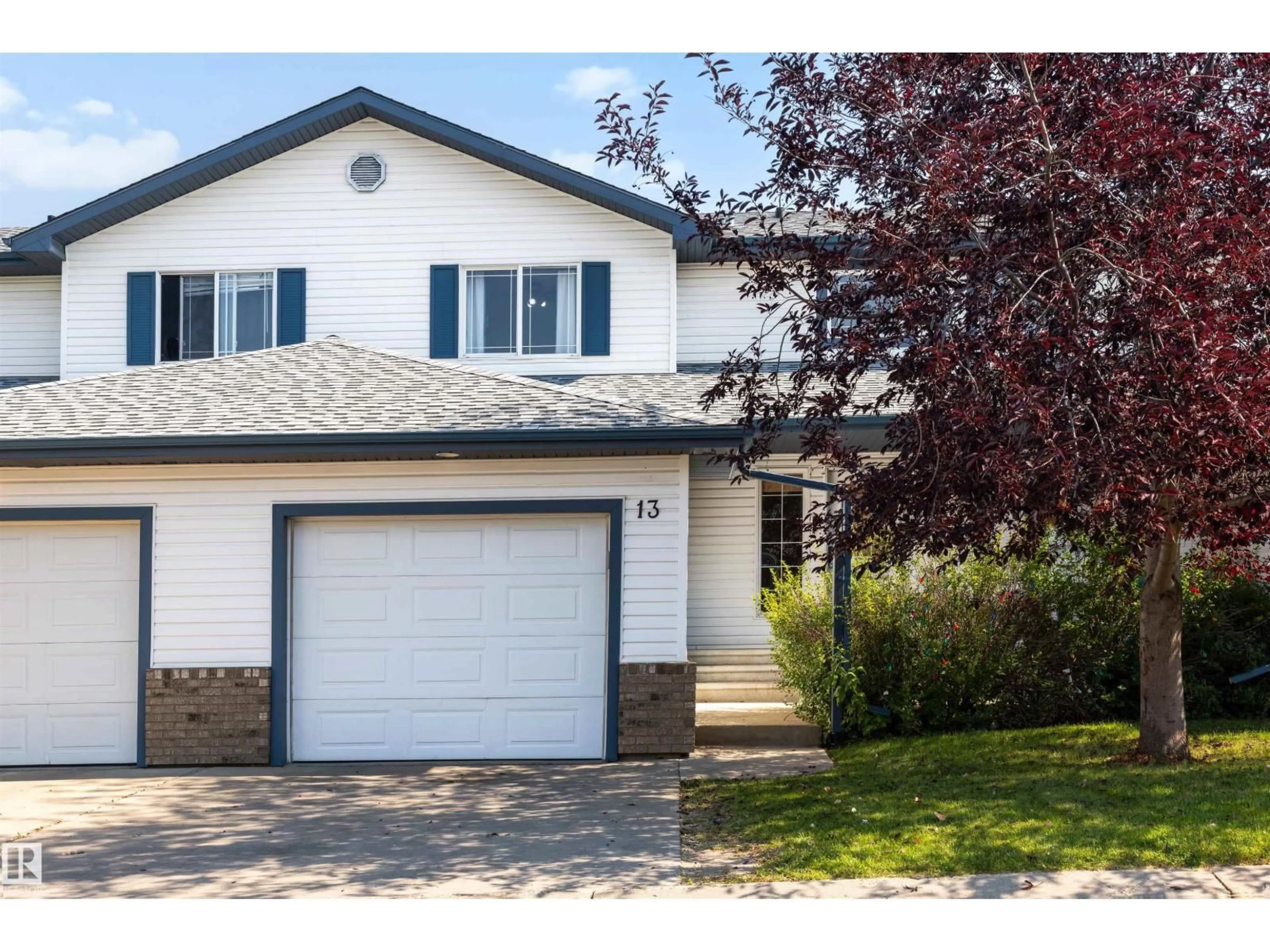 Home with vinyl exterior material, street for #13 - 450 HYNDMAN CR, Edmonton Alberta T5A0E2