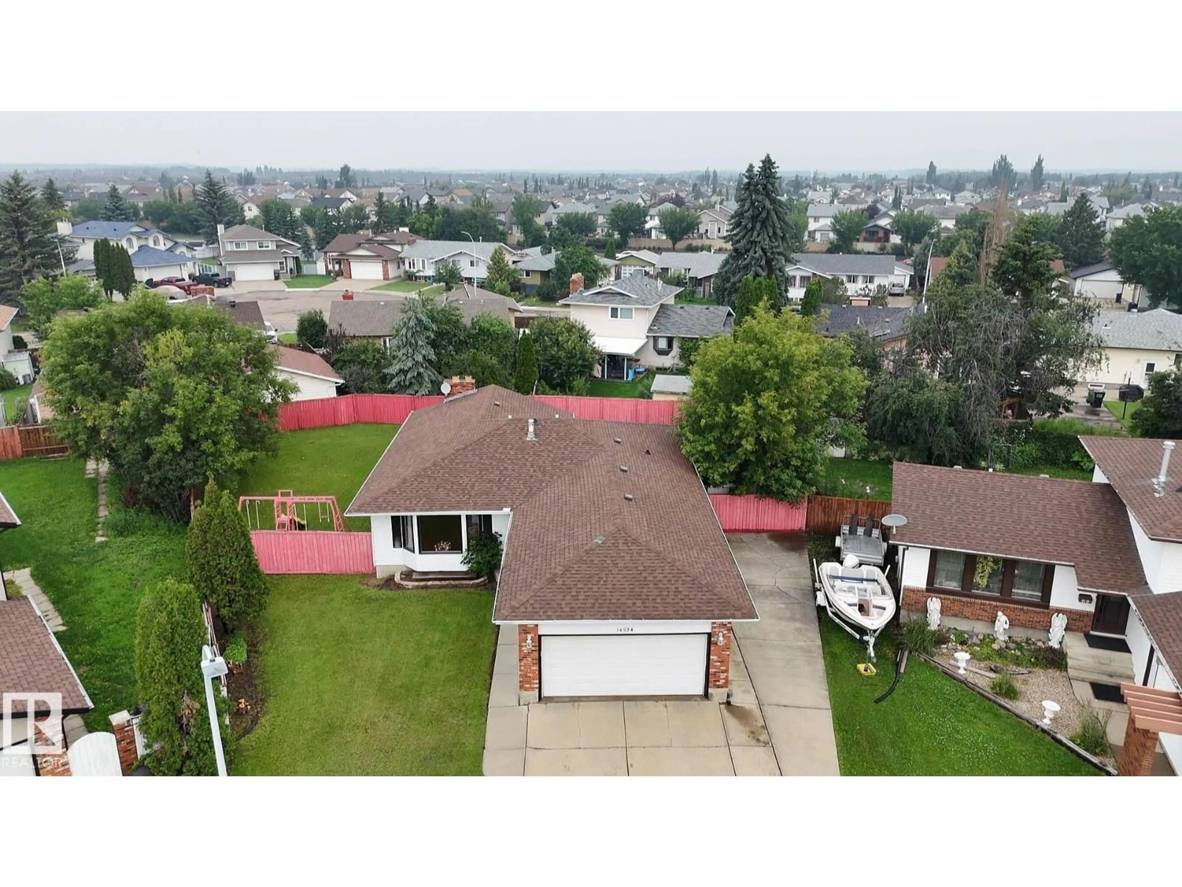 A pic from outside/outdoor area/front of a property/back of a property/a pic from drone, unknown for NW - 16524 116 ST, Edmonton Alberta T5X3T8