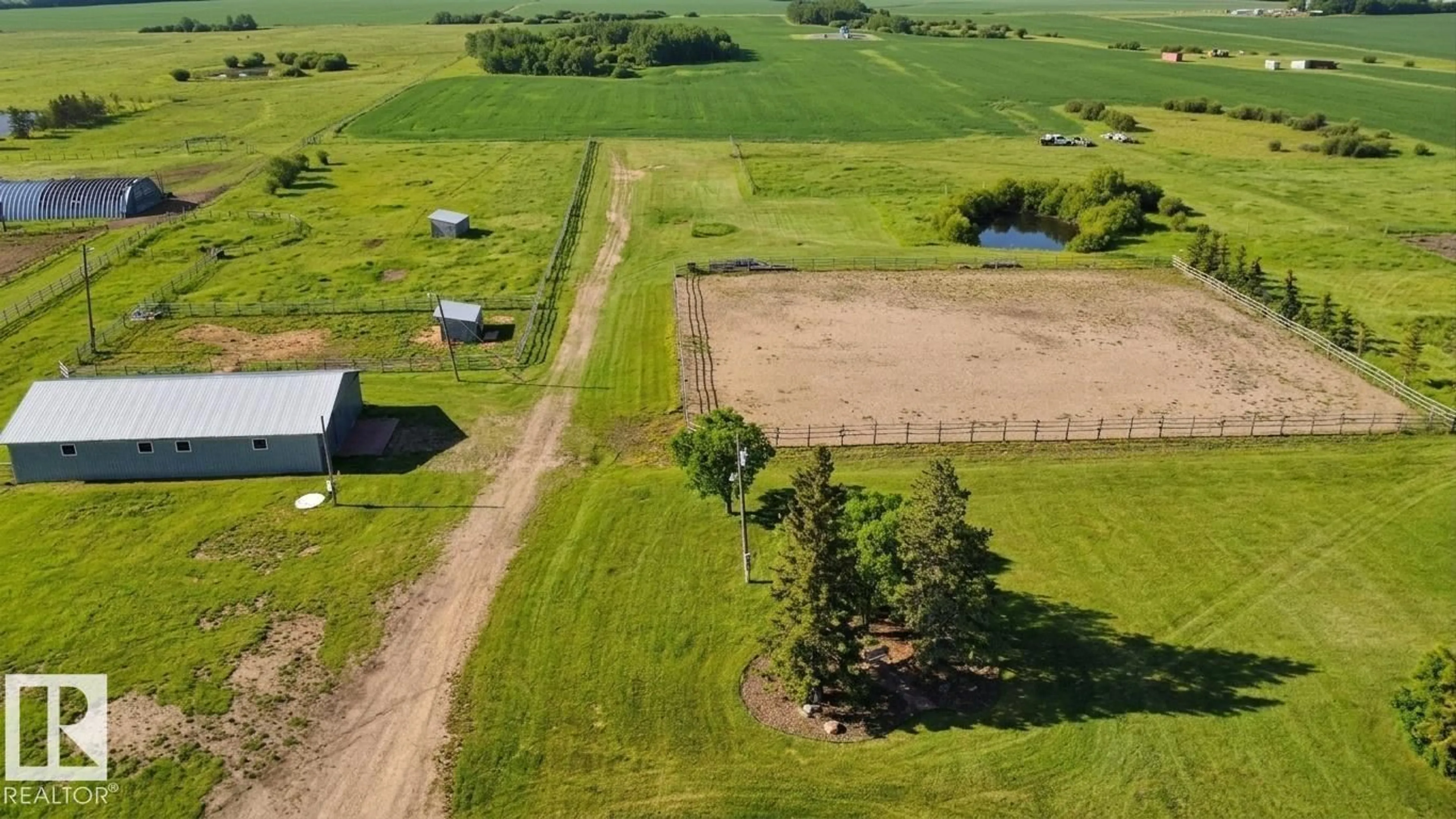 A pic from outside/outdoor area/front of a property/back of a property/a pic from drone, unknown for 26317 TWP ROAD 552, Rural Sturgeon County Alberta T8R1T4