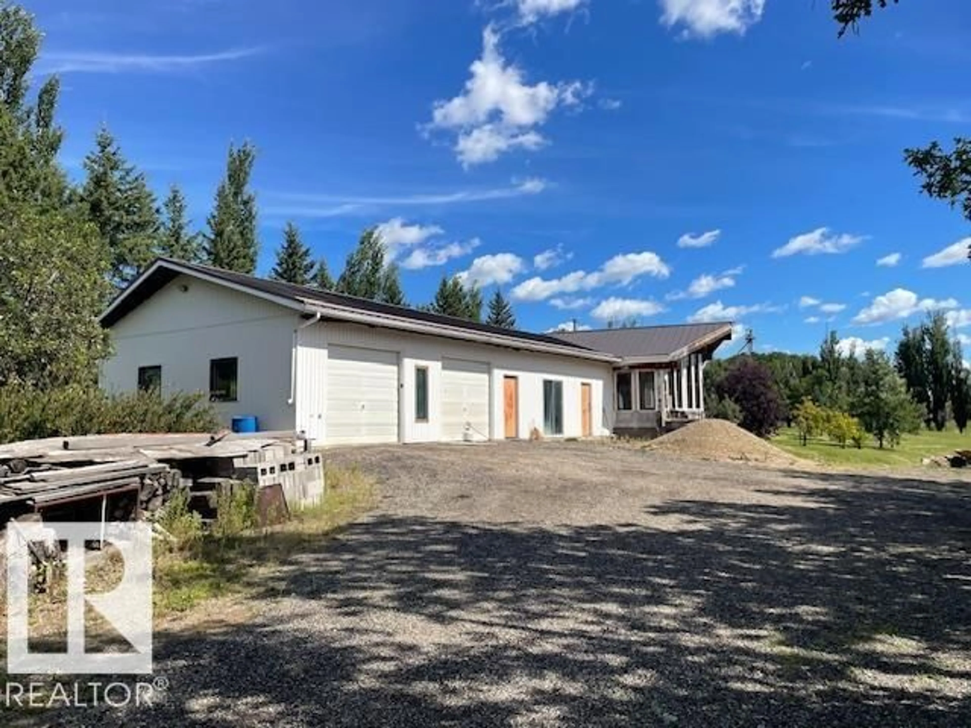 A pic from outside/outdoor area/front of a property/back of a property/a pic from drone, building for 60 50416 RGE RD 245, Rural Leduc County Alberta T4X0P5
