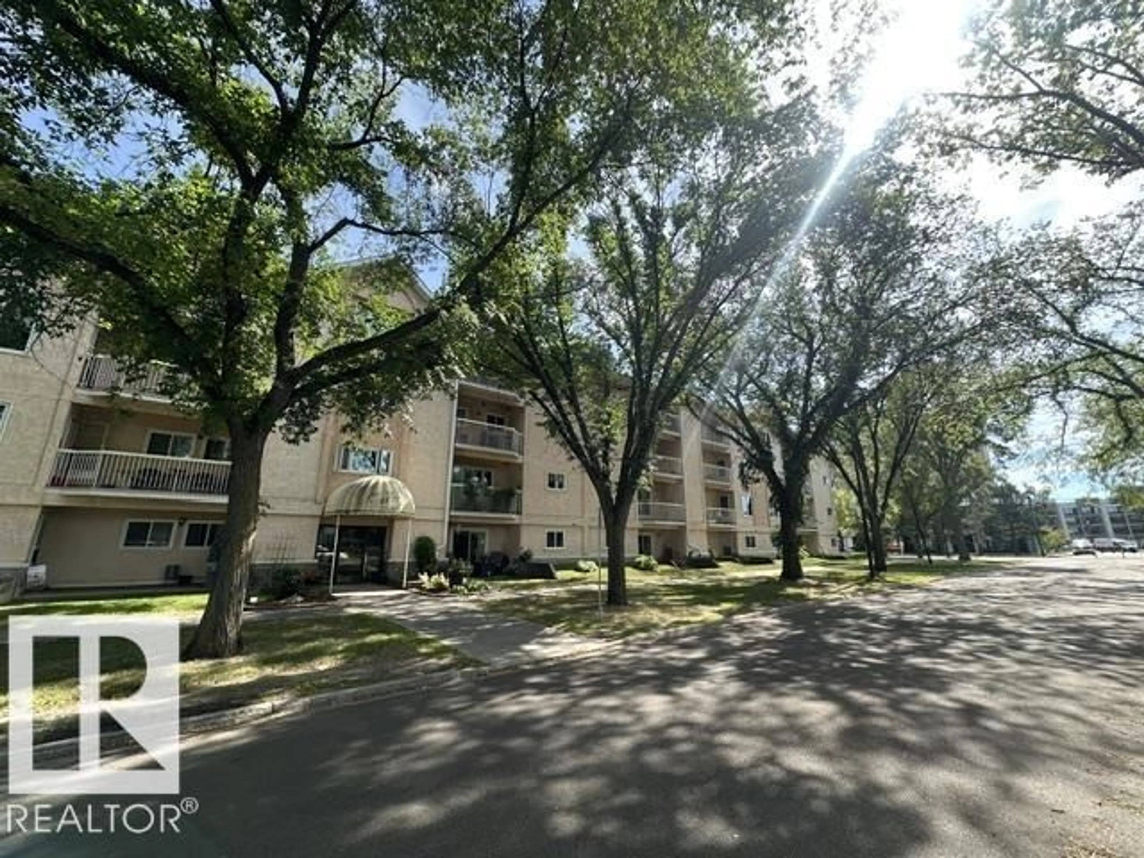 A pic from outside/outdoor area/front of a property/back of a property/a pic from drone, unknown for #115 - 11511 130 ST, Edmonton Alberta T5M4B3