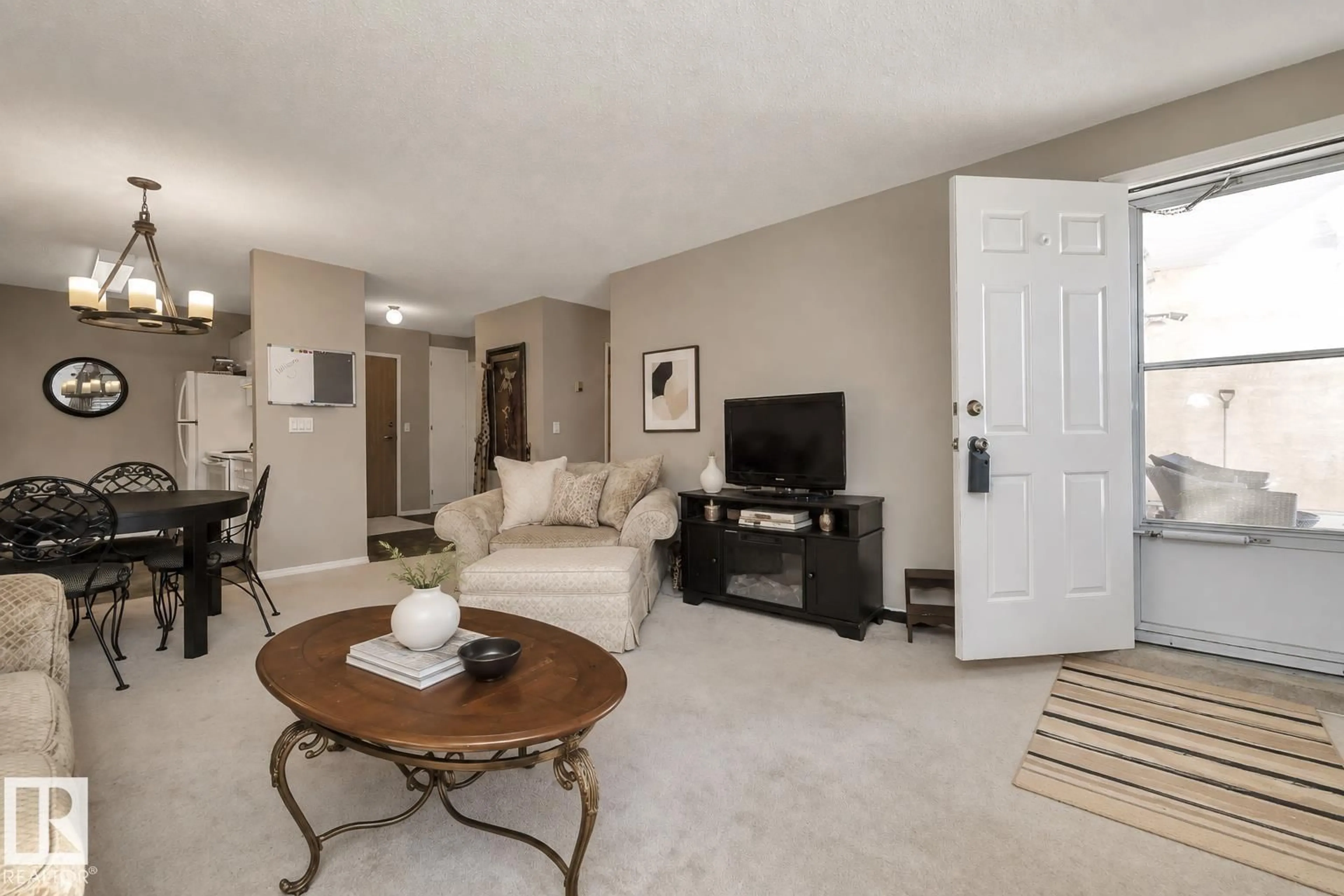 Living room with furniture, unknown for #115 - 11511 130 ST, Edmonton Alberta T5M4B3
