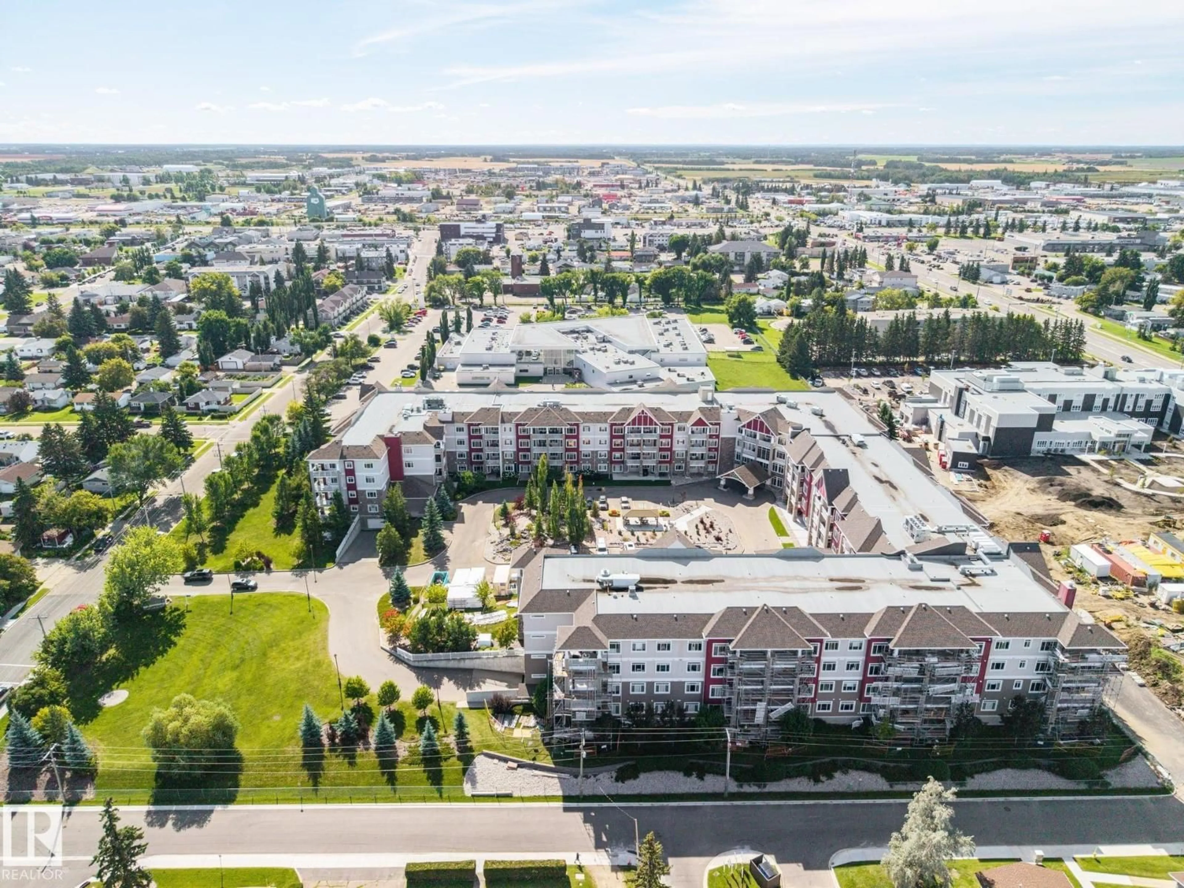 A pic from outside/outdoor area/front of a property/back of a property/a pic from drone, city buildings view from balcony for #318 - 511 QUEEN ST, Spruce Grove Alberta T7X0G4