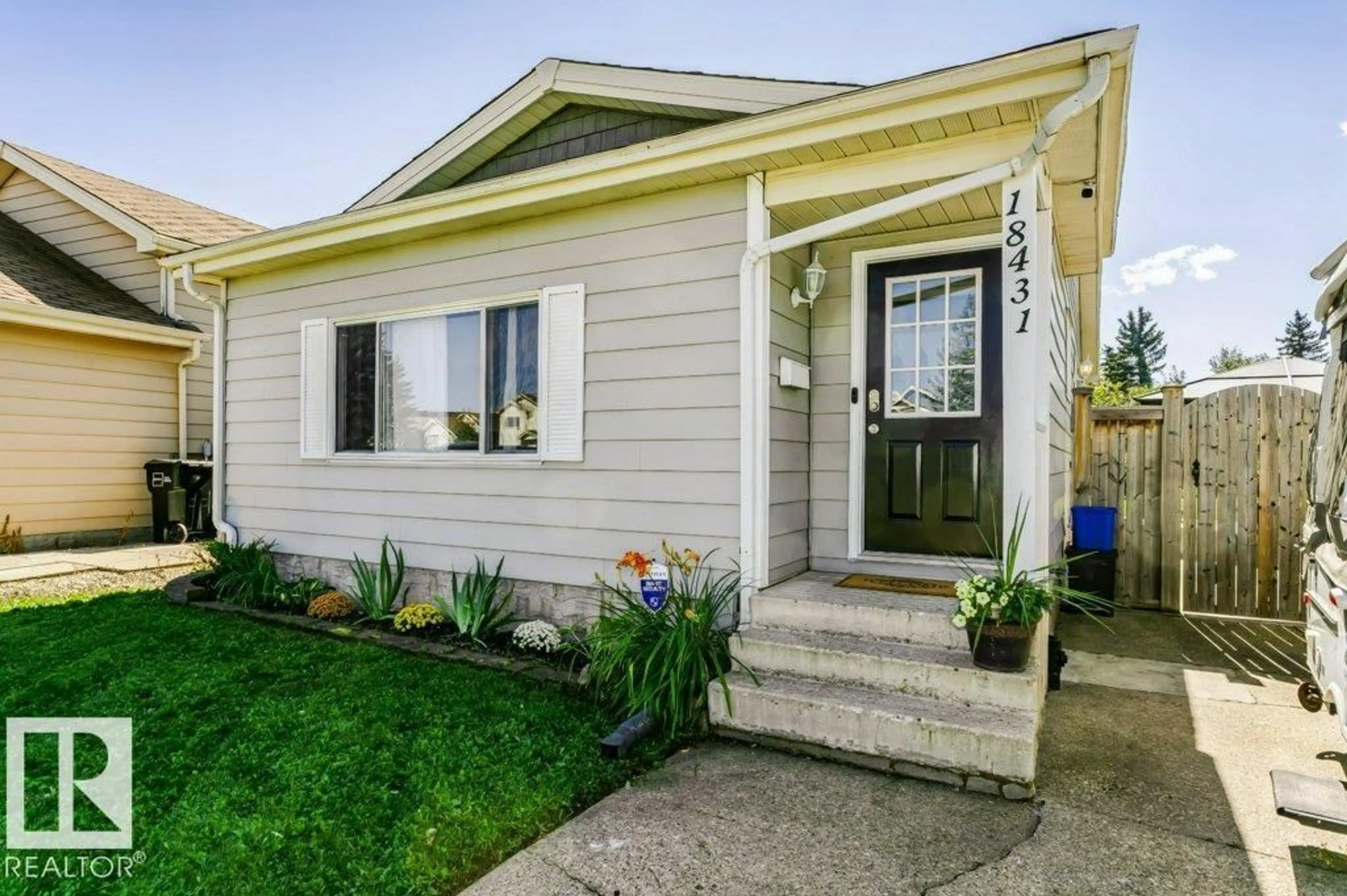 Home with vinyl exterior material, street for 18431 95A AV, Edmonton Alberta T5T3V7