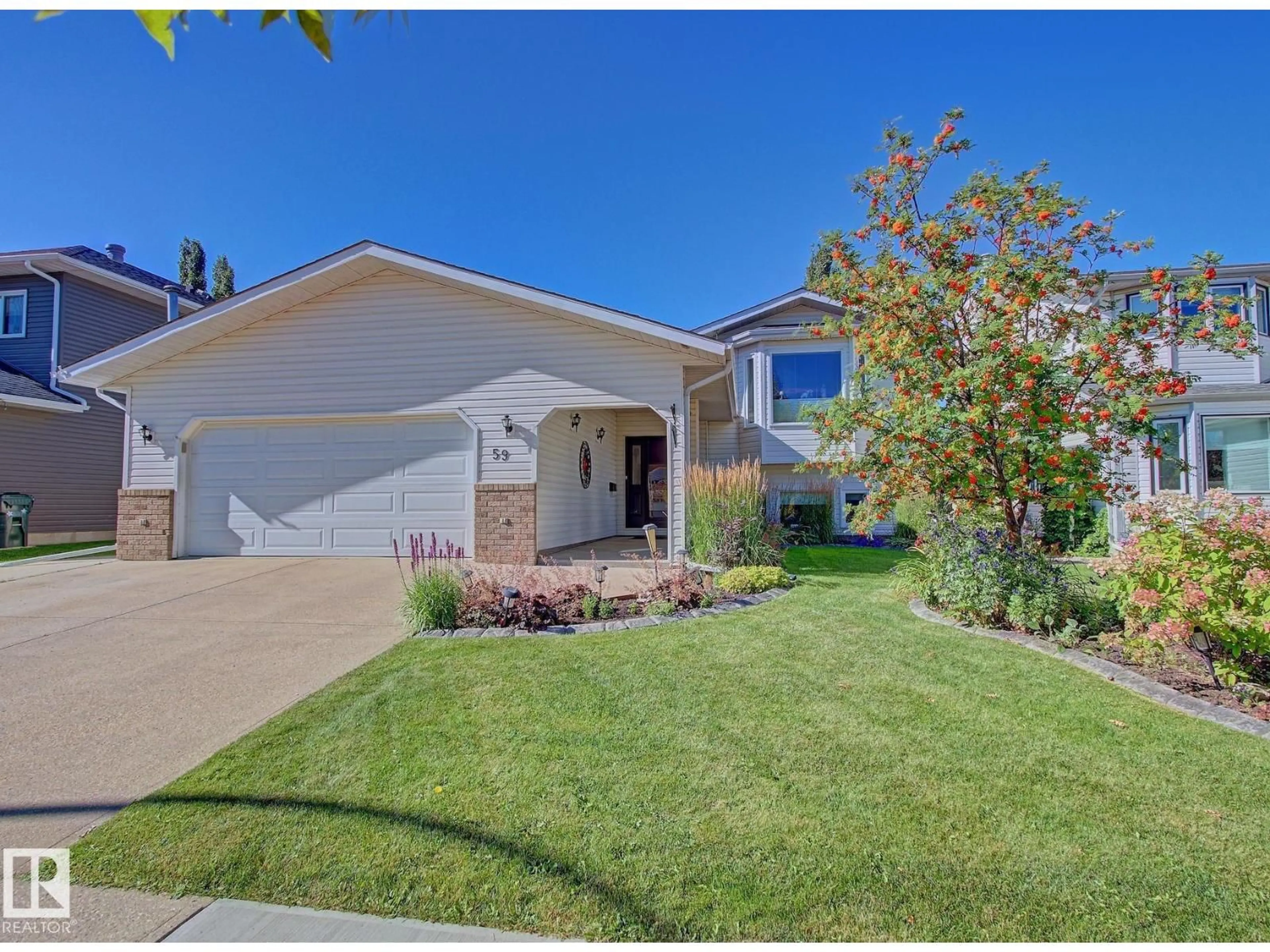Home with vinyl exterior material, street for 59 CIMMARON WY, Sherwood Park Alberta T8H1N4