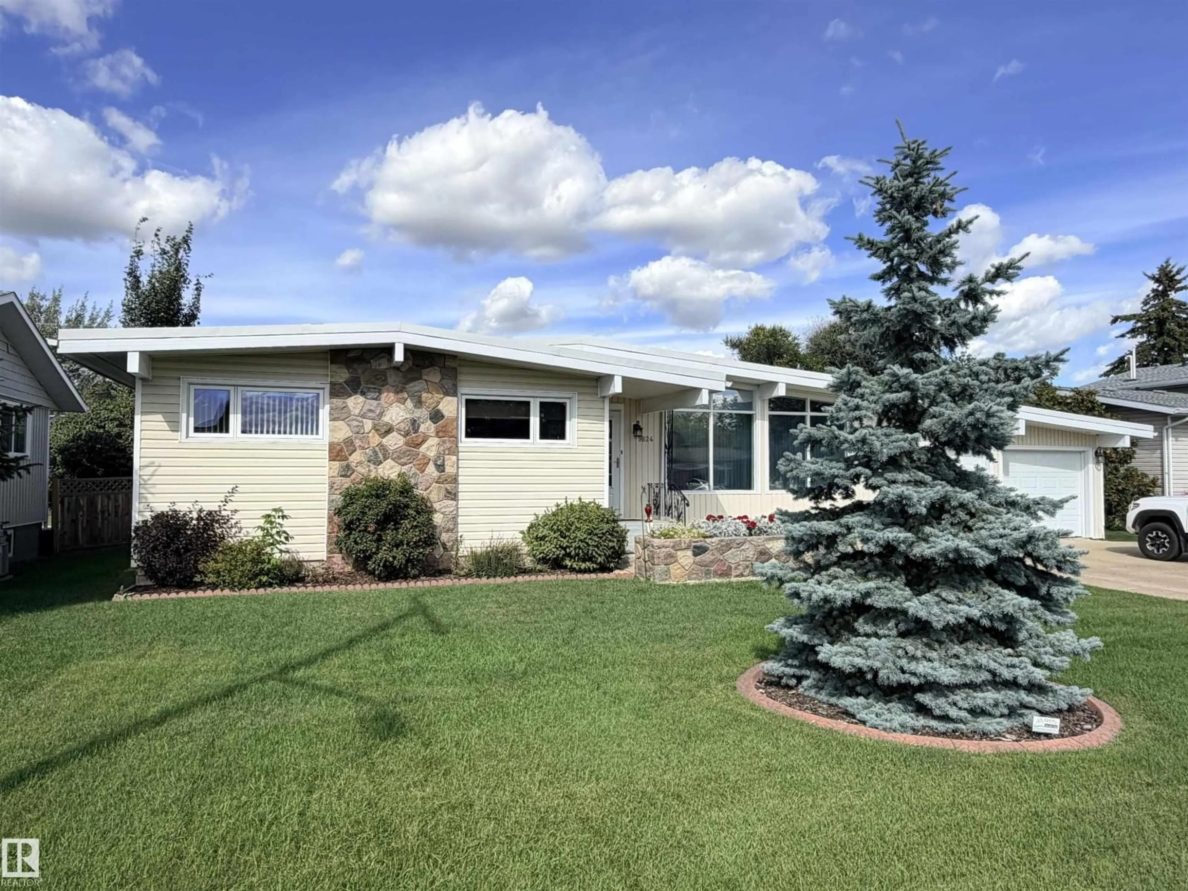 Home with vinyl exterior material, street for 9824 99 ST, Westlock Alberta T7P1Y7