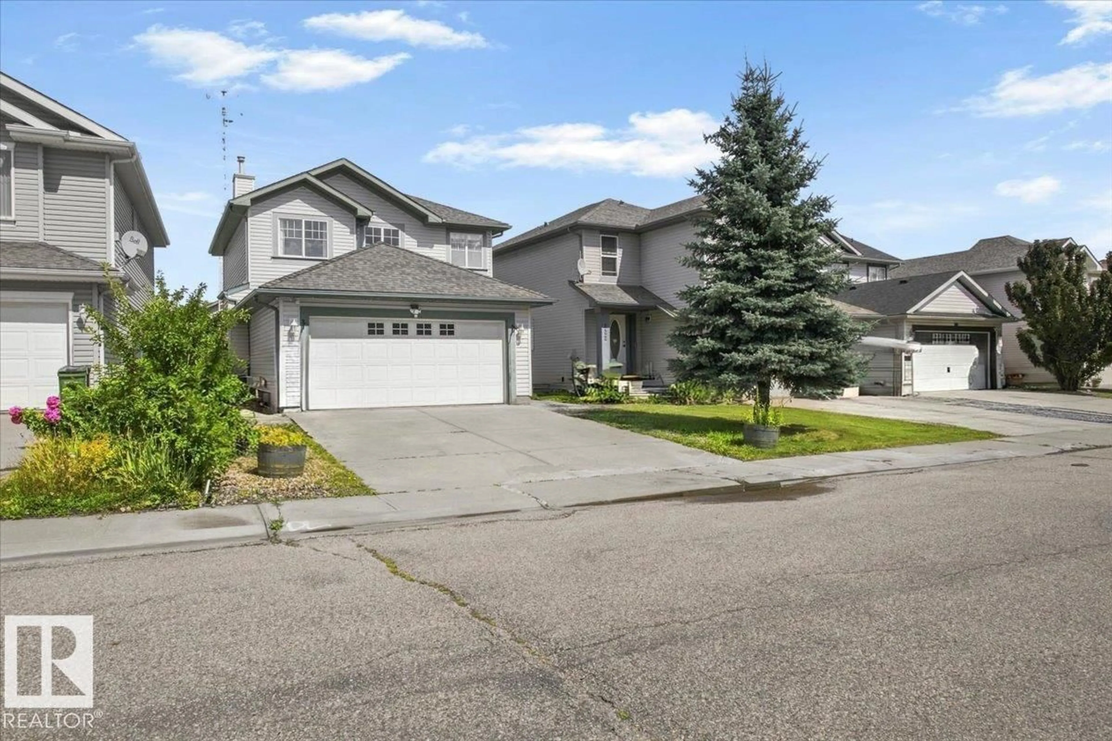 A pic from outside/outdoor area/front of a property/back of a property/a pic from drone, street for 824 BARNES LI SW, Edmonton Alberta T6W1E8