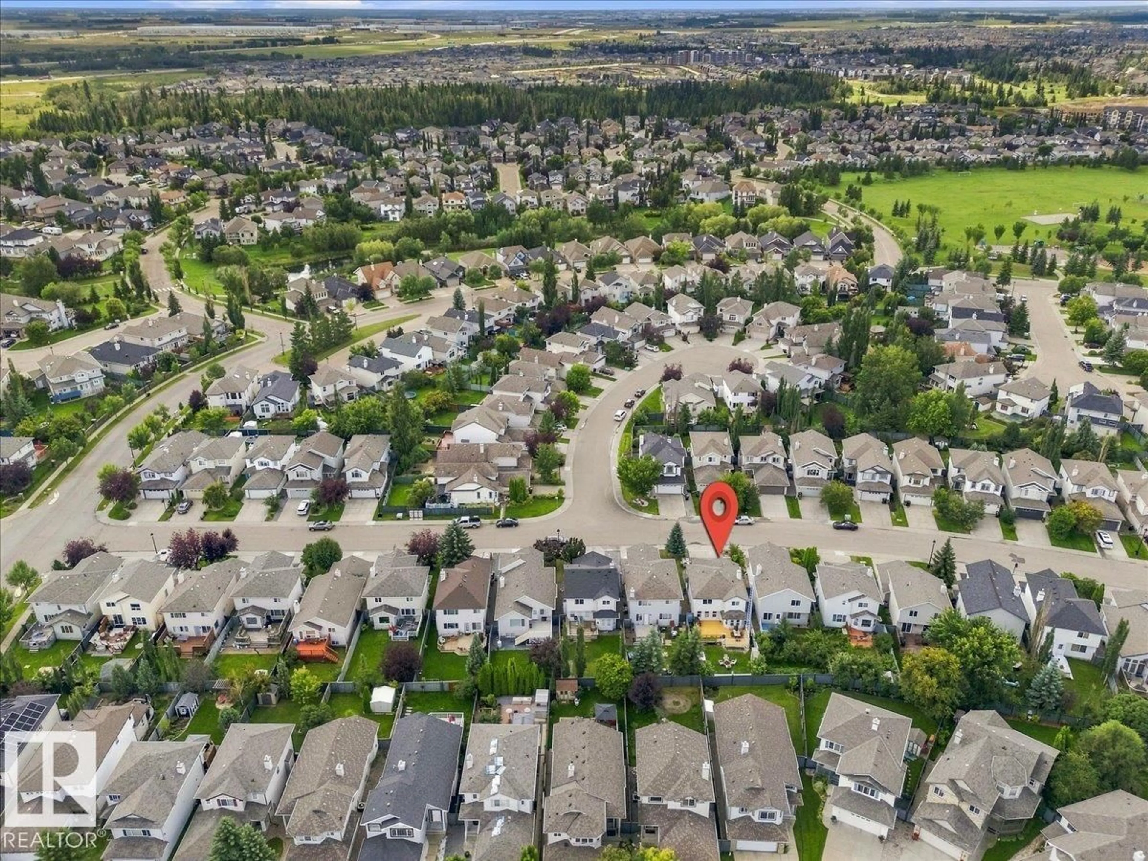 A pic from outside/outdoor area/front of a property/back of a property/a pic from drone, street for 824 BARNES LI SW, Edmonton Alberta T6W1E8
