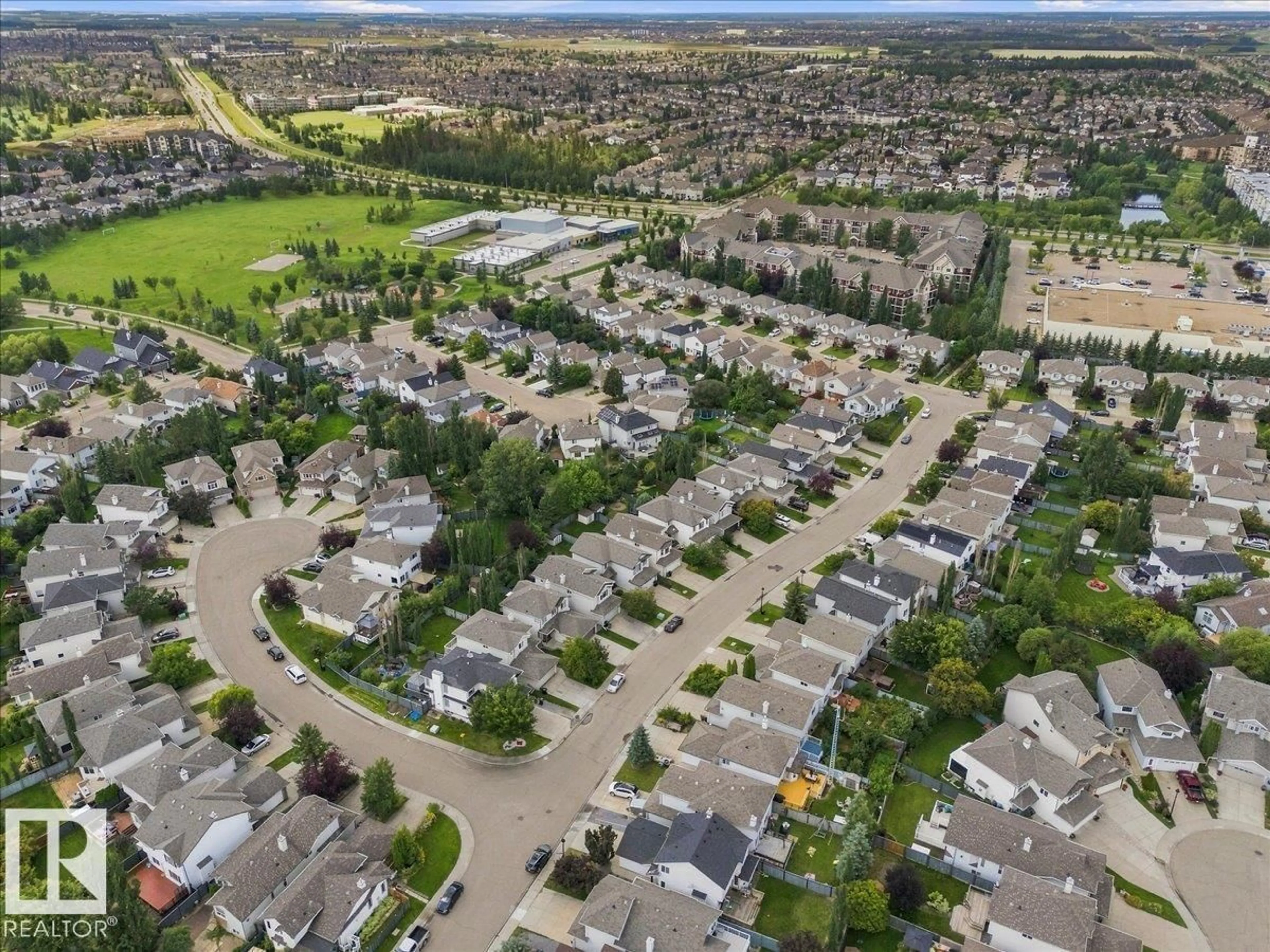 A pic from outside/outdoor area/front of a property/back of a property/a pic from drone, street for 824 BARNES LI SW, Edmonton Alberta T6W1E8