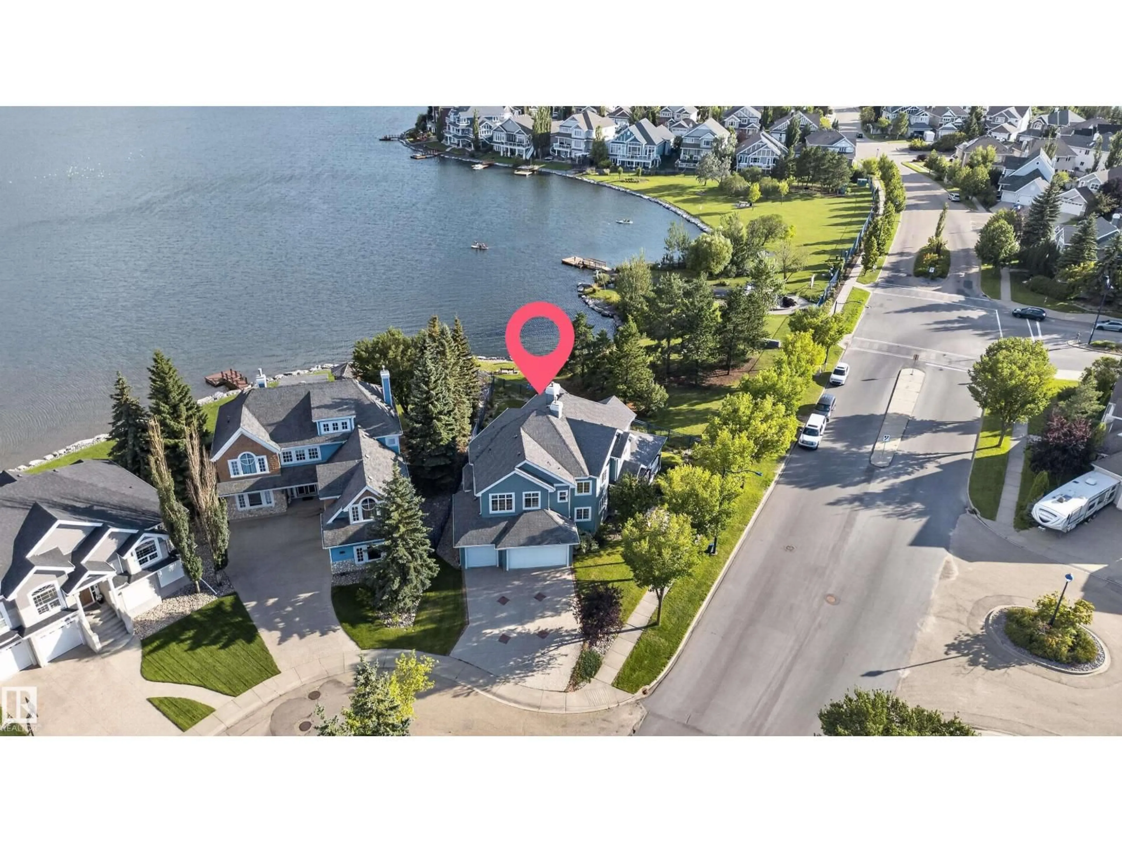 A pic from outside/outdoor area/front of a property/back of a property/a pic from drone, water/lake/river/ocean view for 1251 SUMMERSIDE DR, Edmonton Alberta T6X1B1