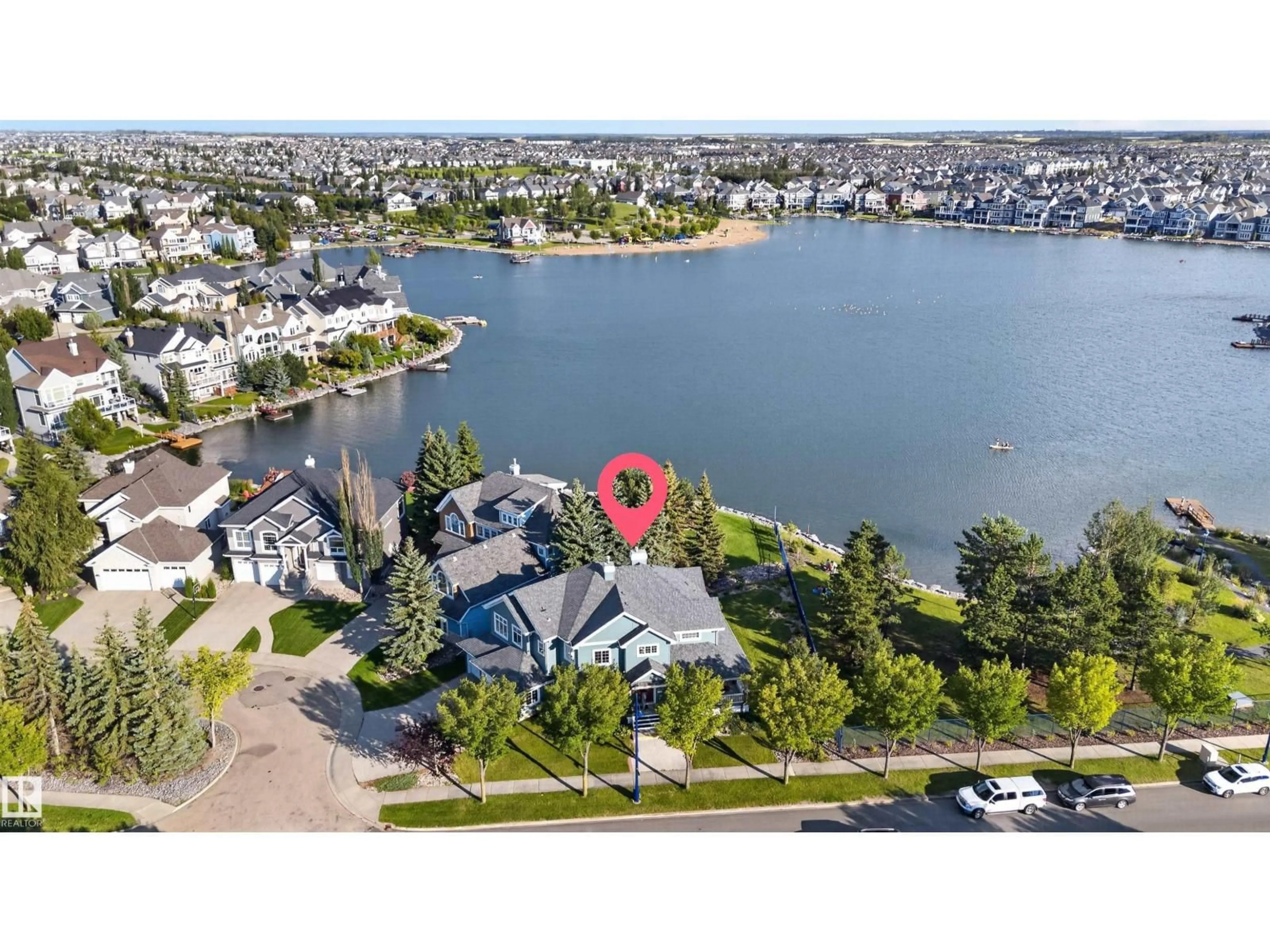 A pic from outside/outdoor area/front of a property/back of a property/a pic from drone, water/lake/river/ocean view for 1251 SUMMERSIDE DR, Edmonton Alberta T6X1B1