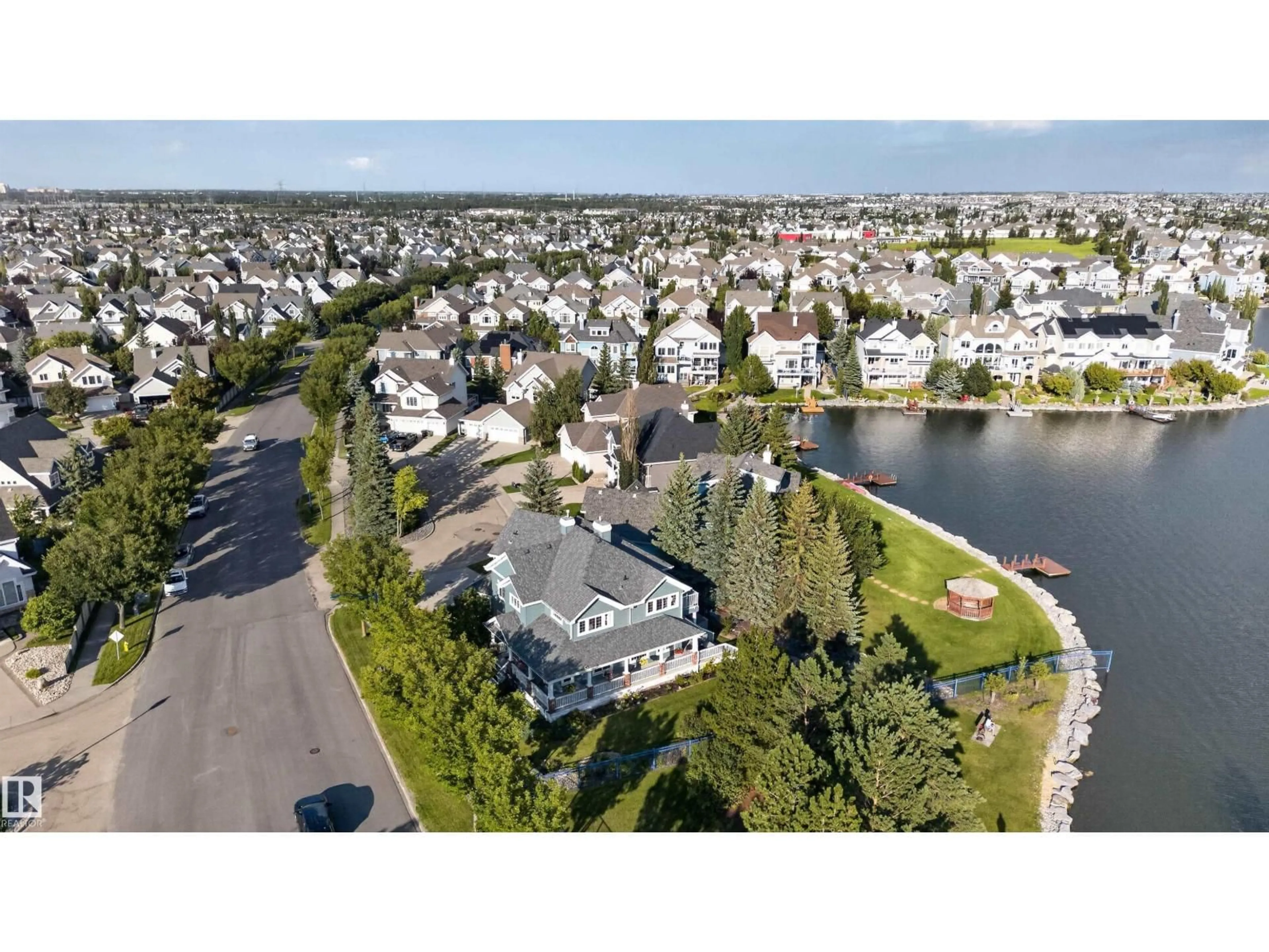 A pic from outside/outdoor area/front of a property/back of a property/a pic from drone, water/lake/river/ocean view for 1251 SUMMERSIDE DR, Edmonton Alberta T6X1B1