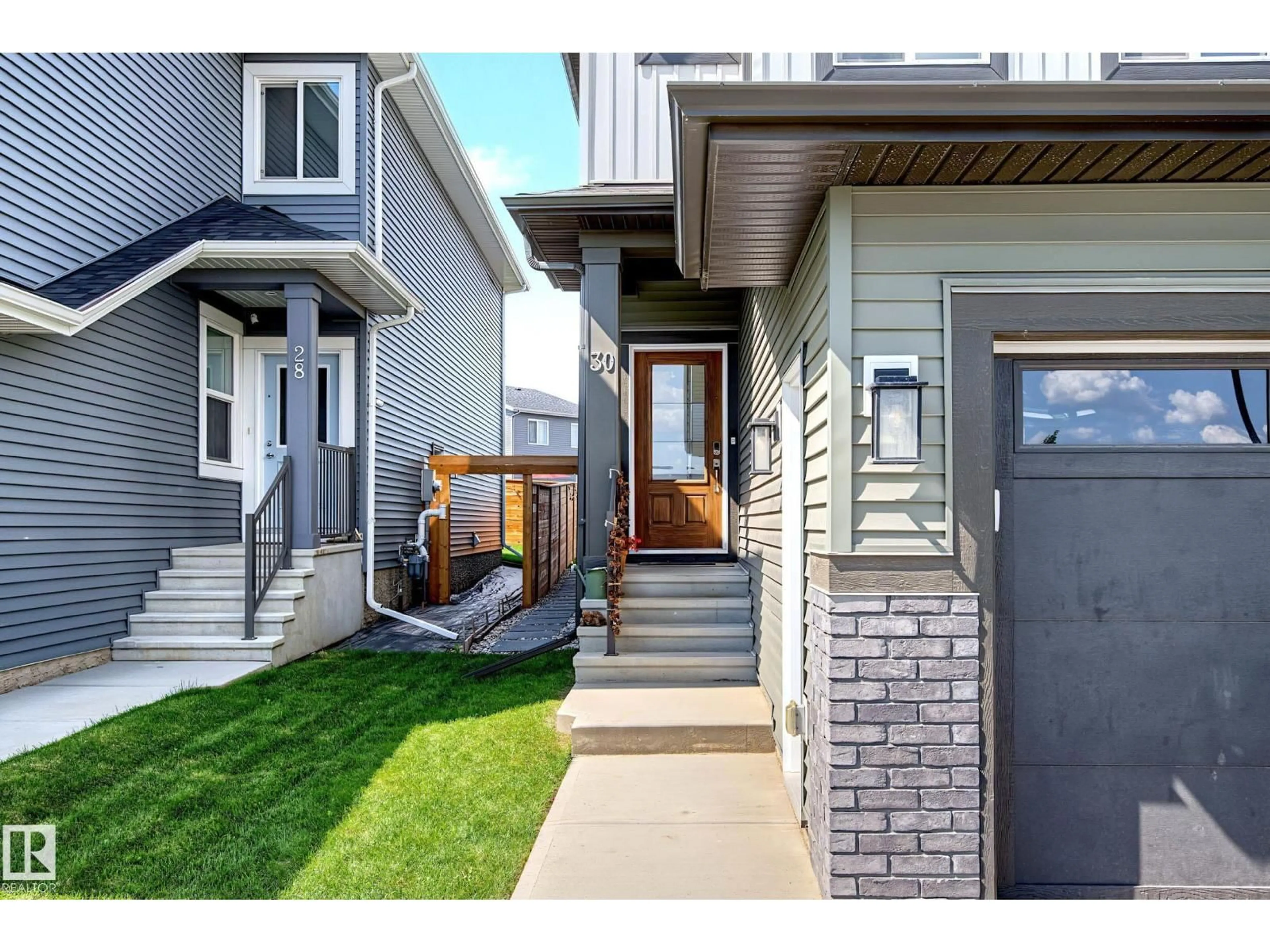 Home with vinyl exterior material, street for 30 ROSEWOOD WY, St. Albert Alberta T8N7Y8