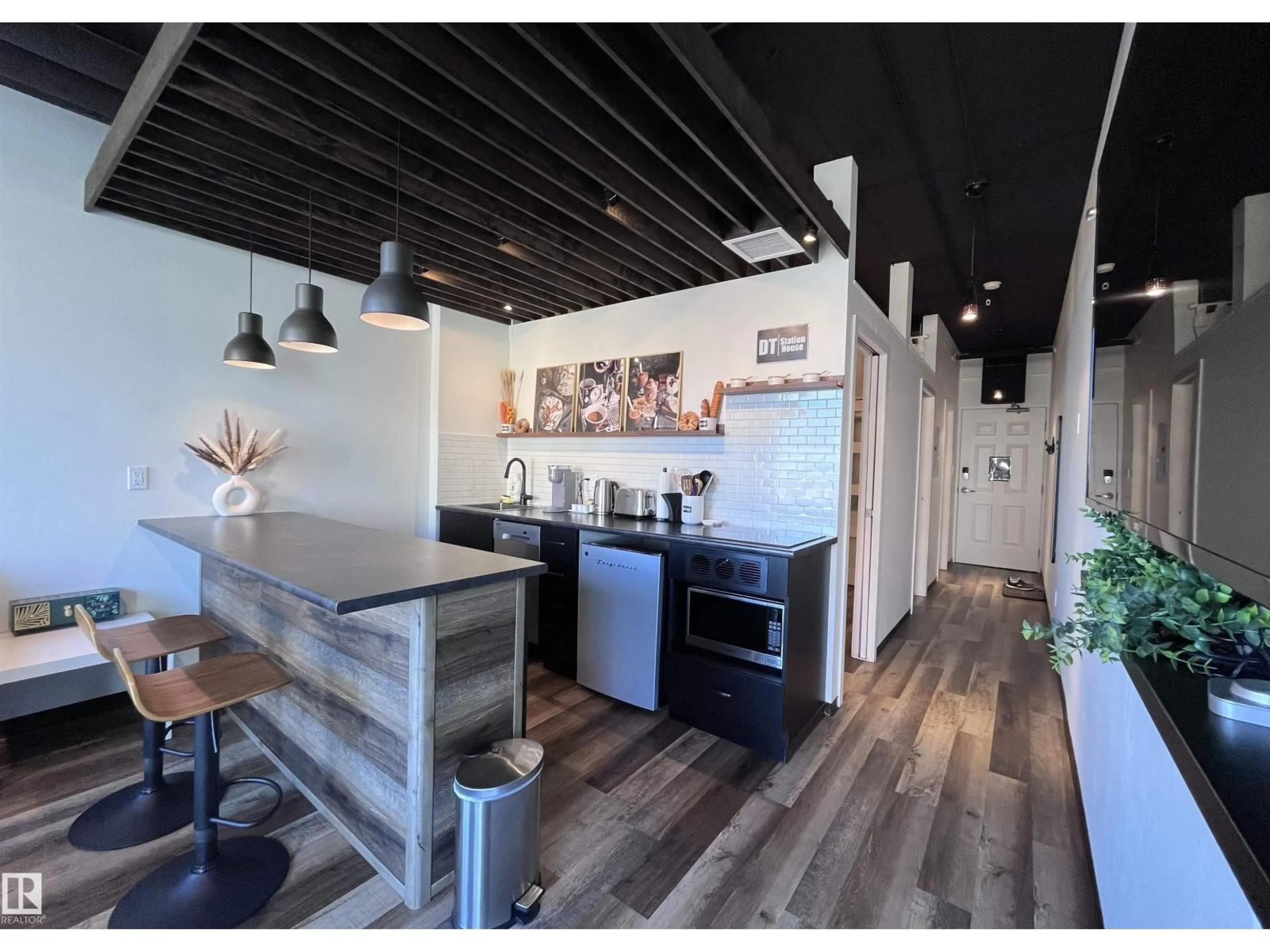 Open concept kitchen, unknown for 1701 JASPER AV NW, Edmonton Alberta T5J1R9