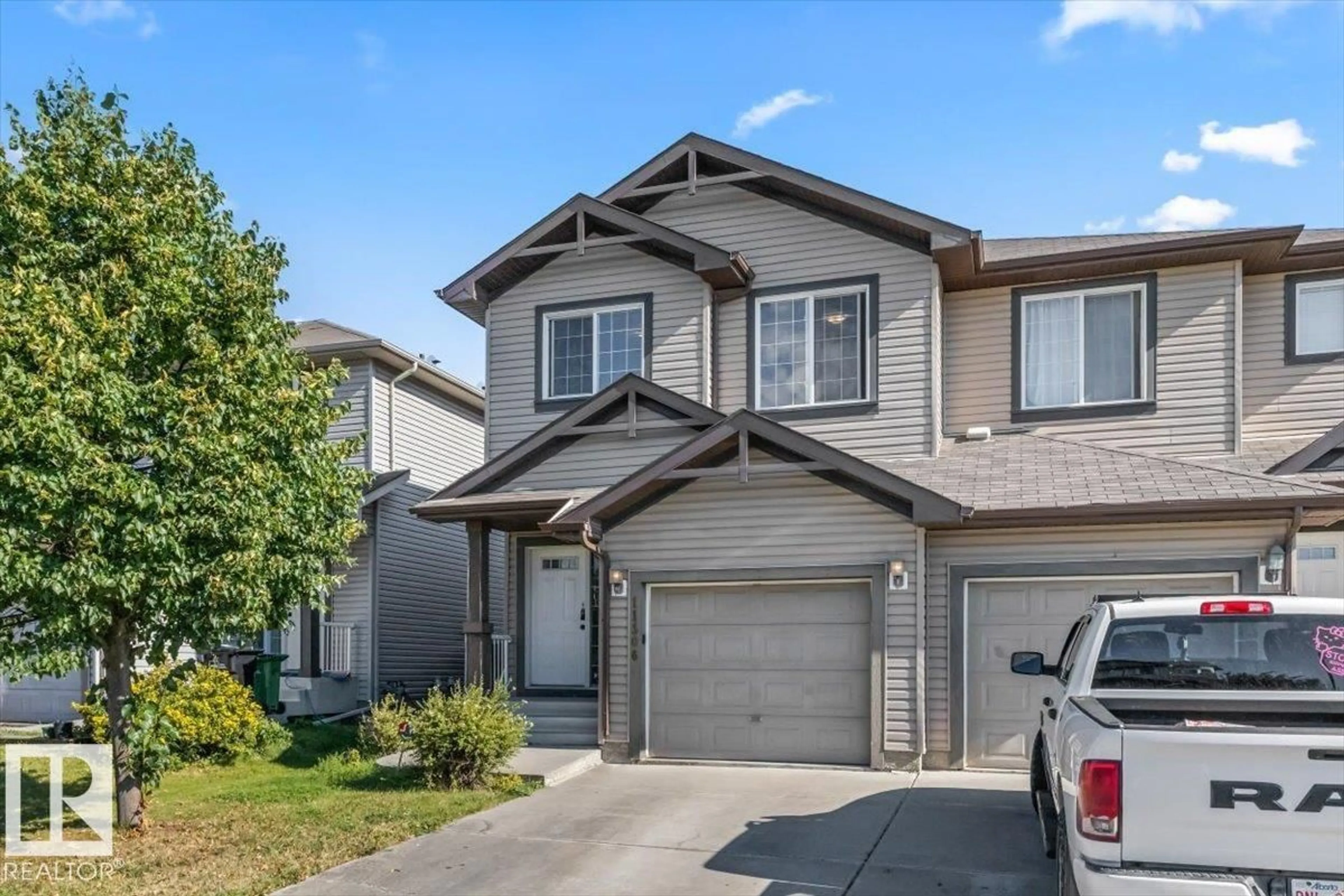 Home with vinyl exterior material, street for 11506 17 AV, Edmonton Alberta T6W1Y4