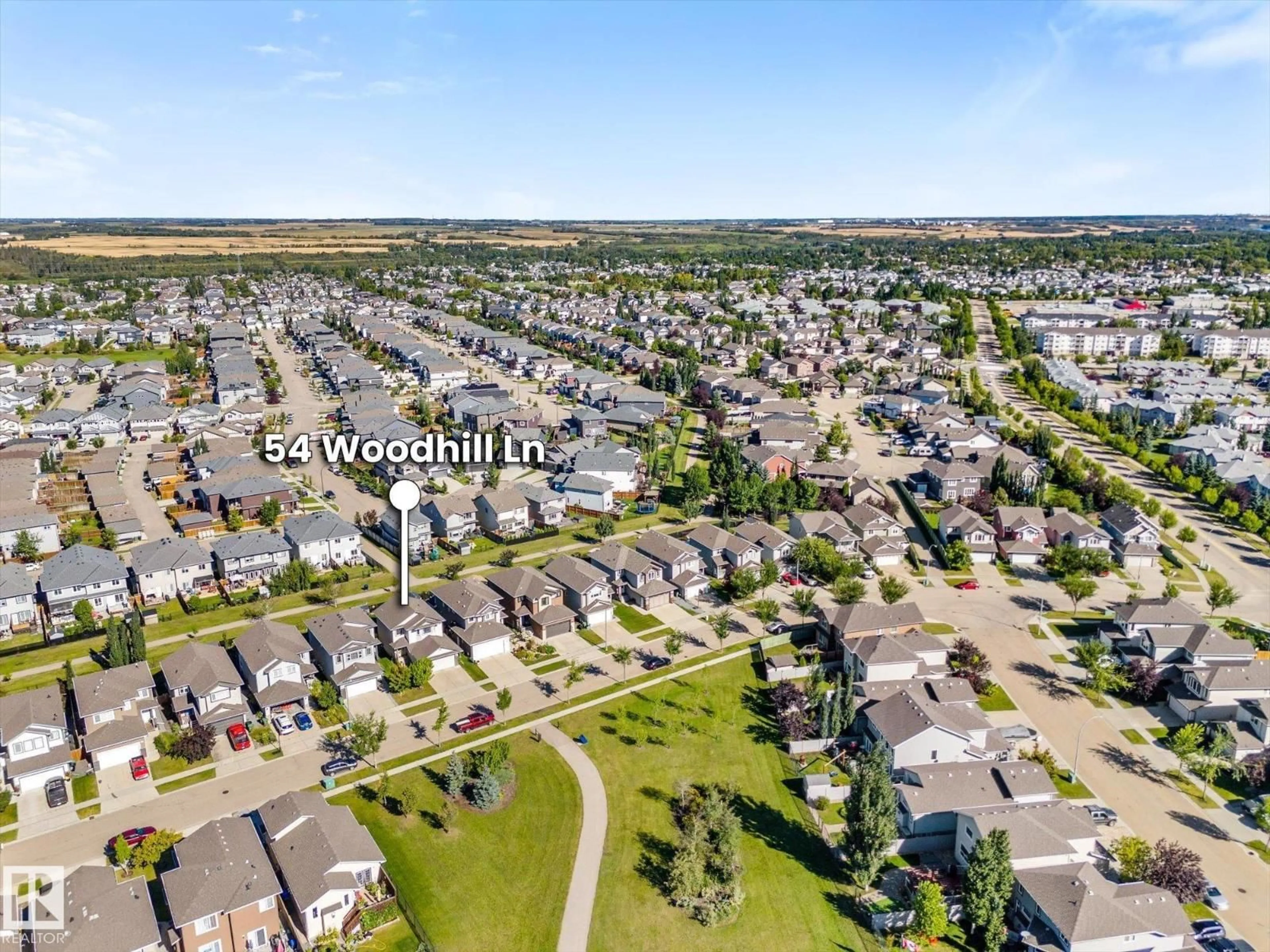 A pic from outside/outdoor area/front of a property/back of a property/a pic from drone, unknown for 54 WOODHILL LN, Fort Saskatchewan Alberta T8L0C9