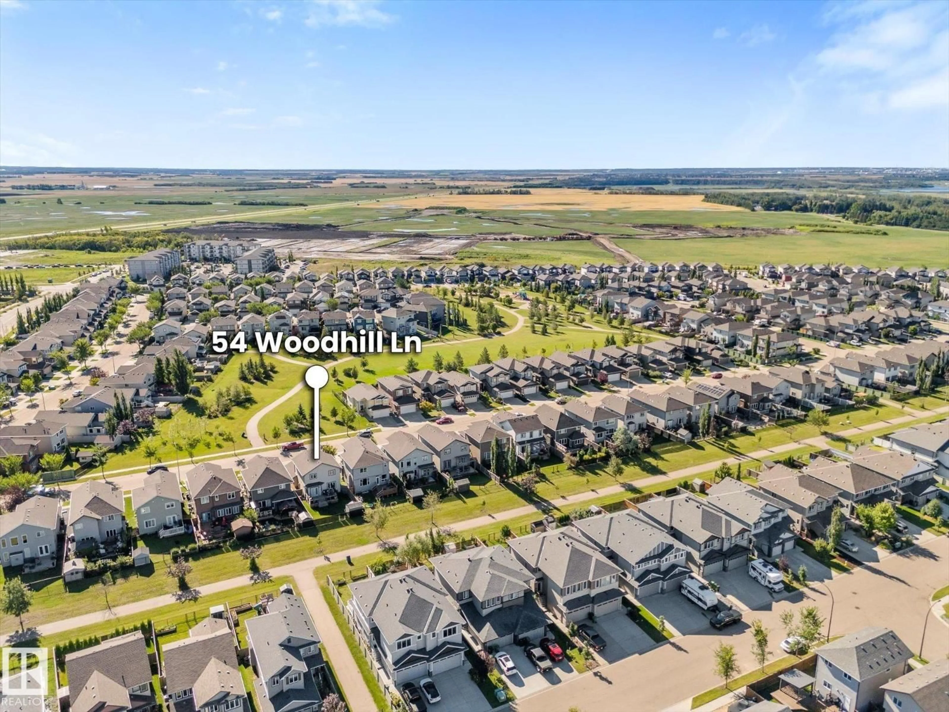 A pic from outside/outdoor area/front of a property/back of a property/a pic from drone, water/lake/river/ocean view for 54 WOODHILL LN, Fort Saskatchewan Alberta T8L0C9
