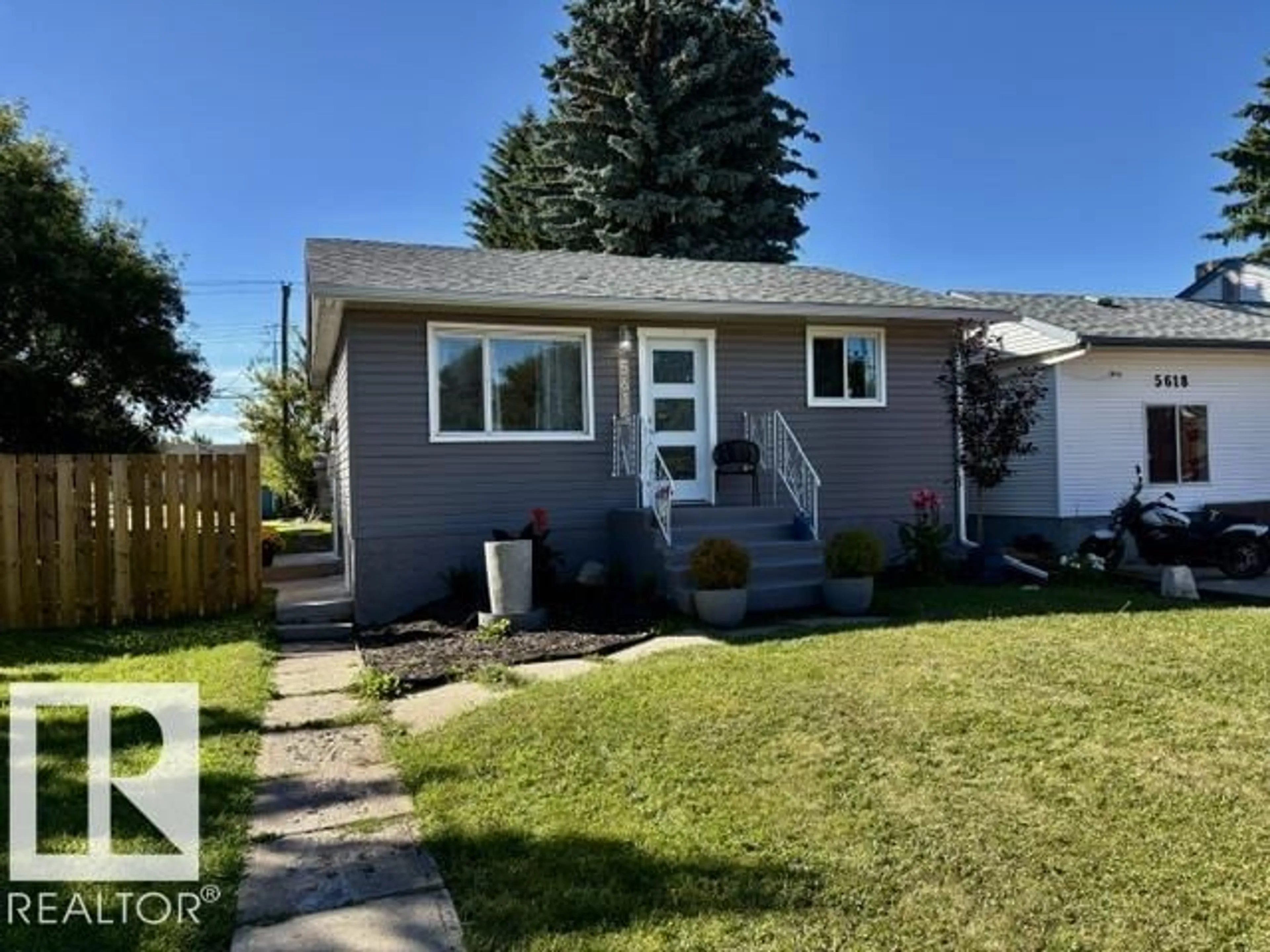 Home with vinyl exterior material, street for 5614 50 ST, Vegreville Alberta T9C1K3