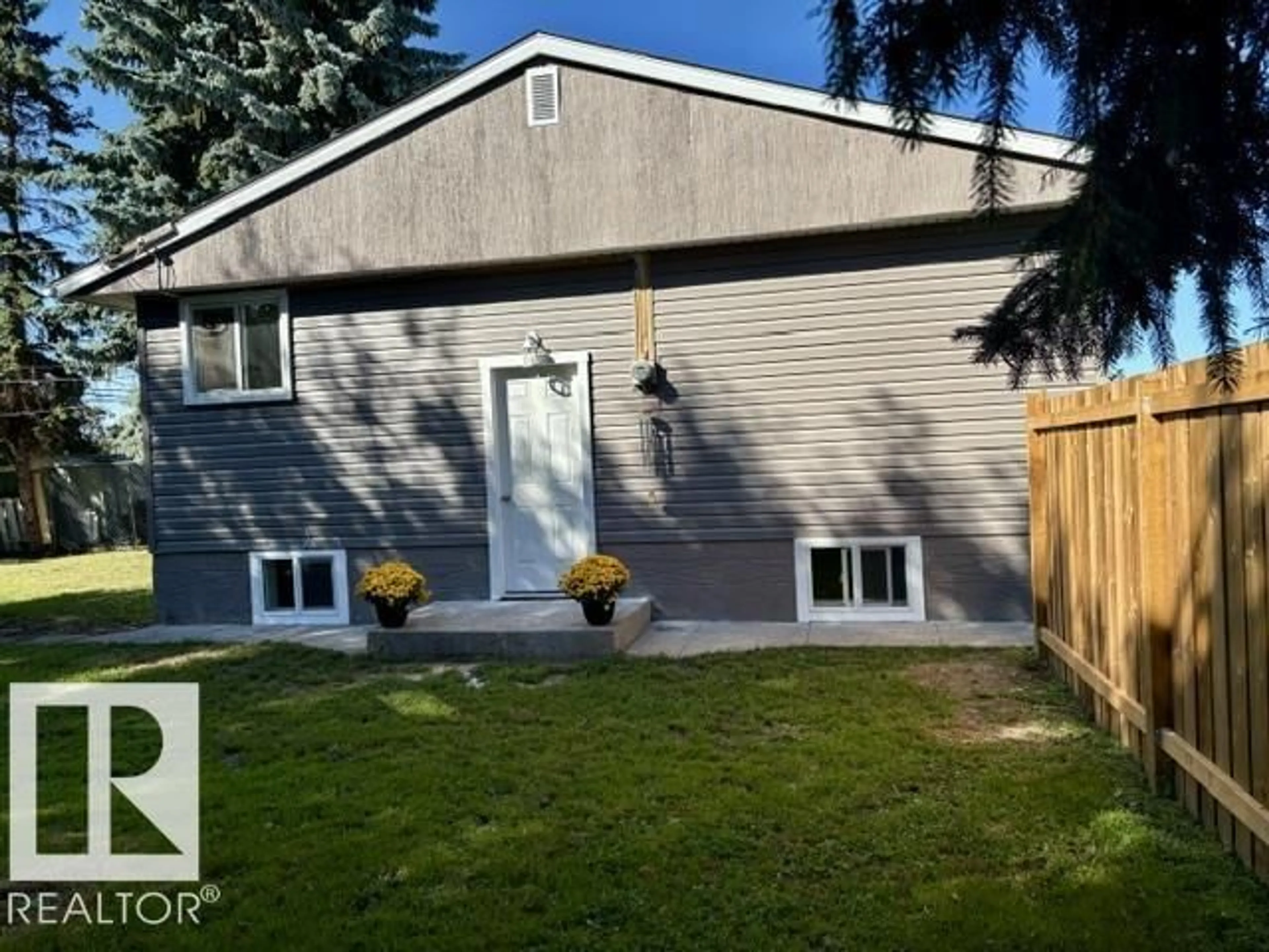 Home with vinyl exterior material, street for 5614 50 ST, Vegreville Alberta T9C1K3