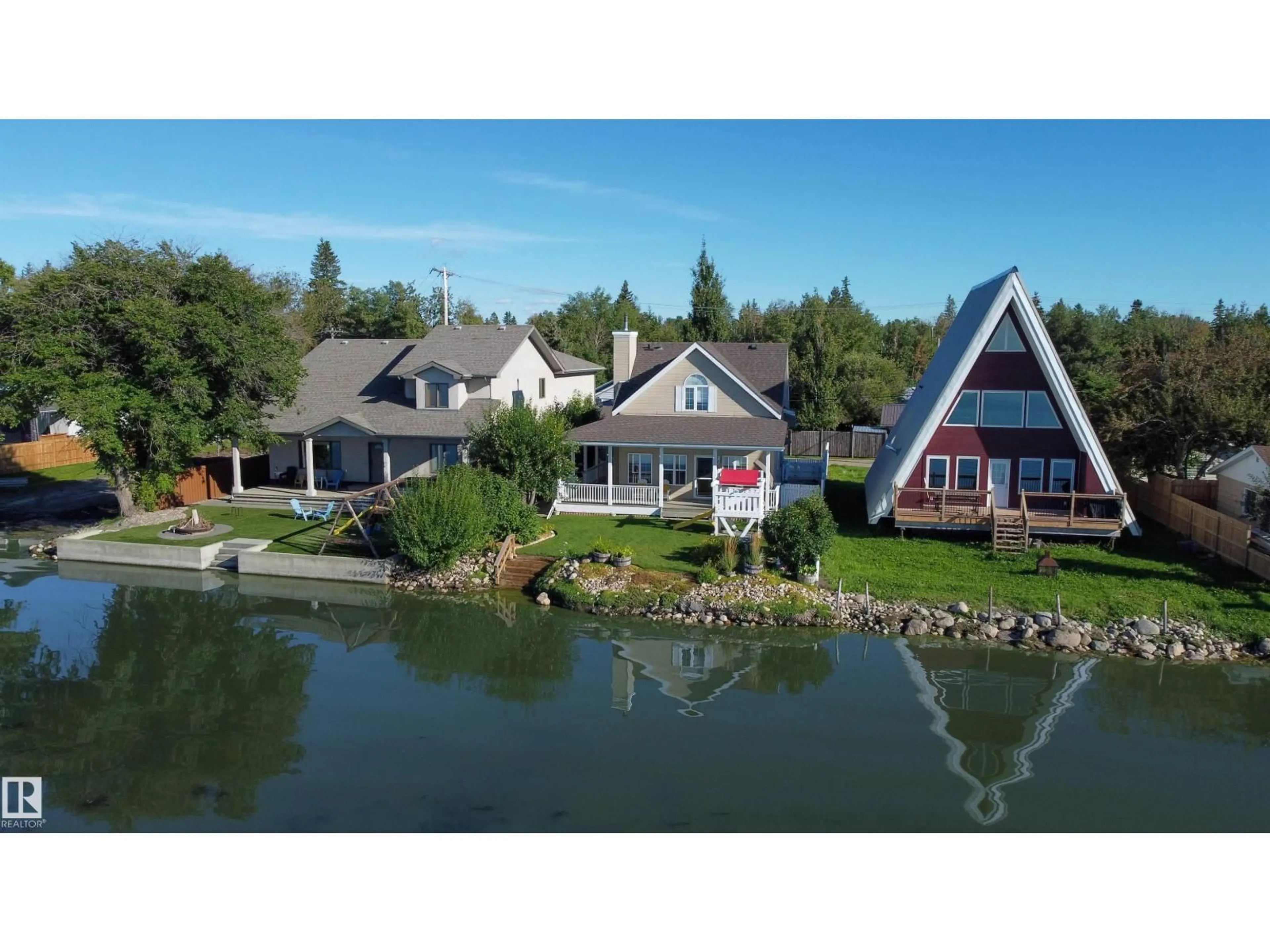 A pic from outside/outdoor area/front of a property/back of a property/a pic from drone, water/lake/river/ocean view for 5309 51 AV, Rural Lac Ste. Anne County Alberta T0E0A0