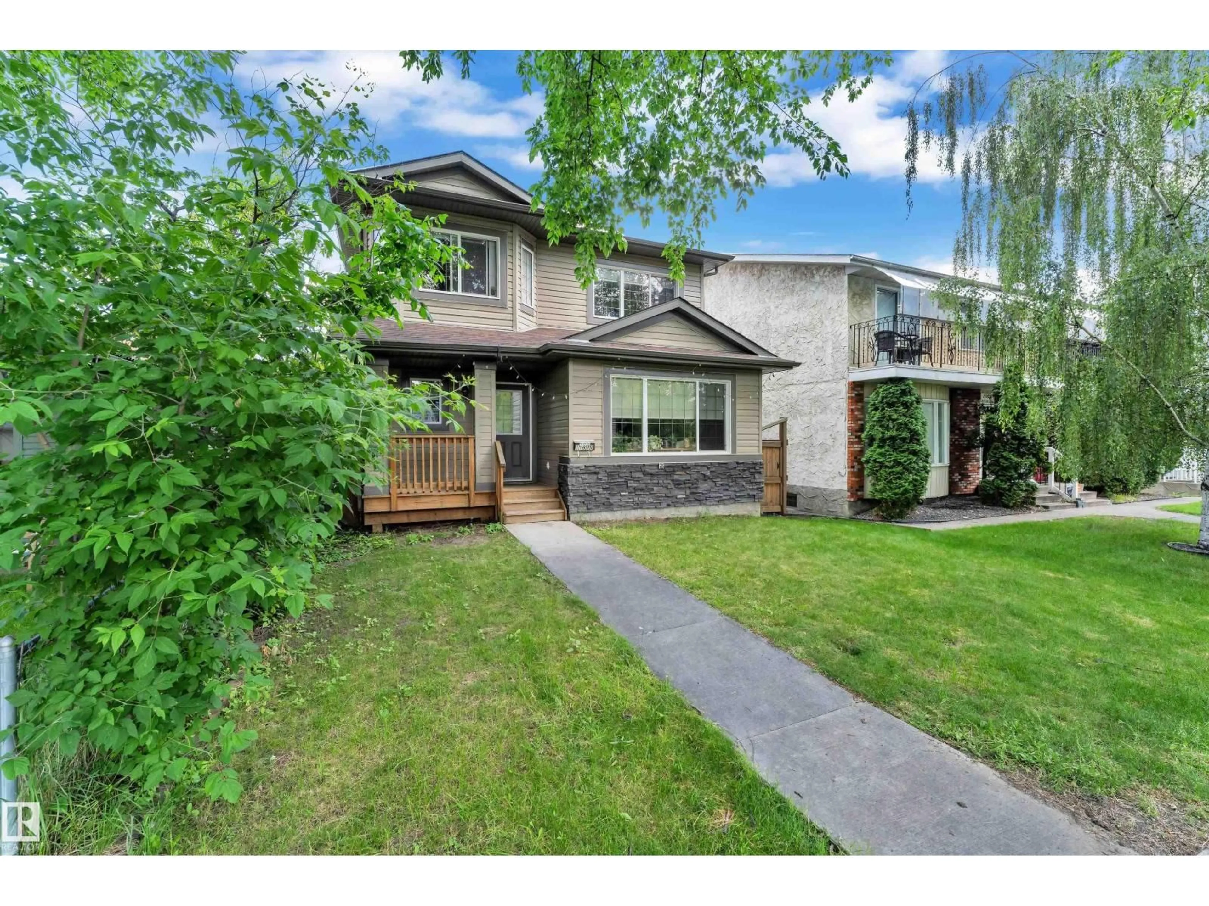 Home with vinyl exterior material, street for 11929 63 STREET, Edmonton Alberta T5W4G2