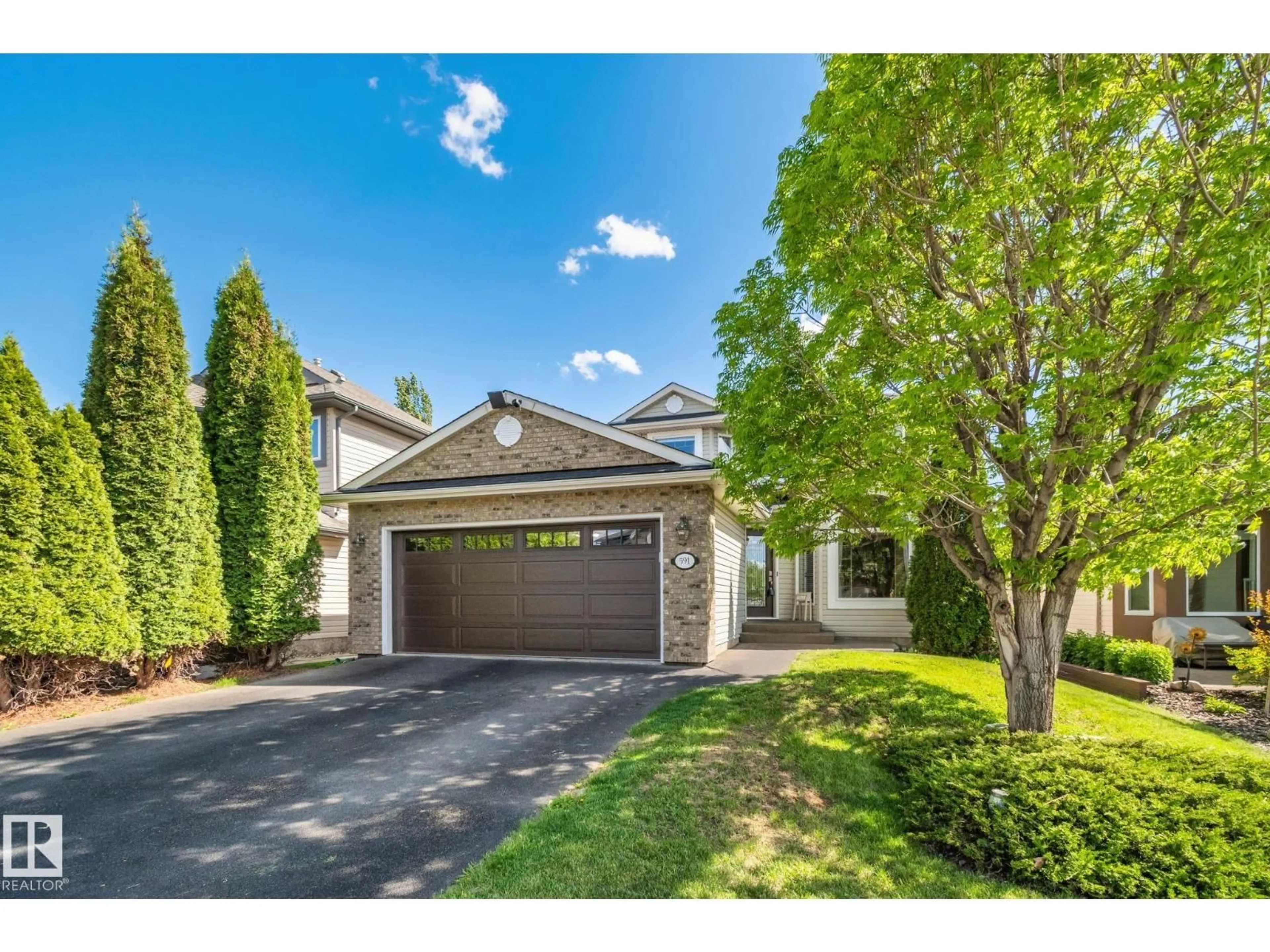 Home with vinyl exterior material, street for SW - 591 BYRNE CR, Edmonton Alberta T6W1E7