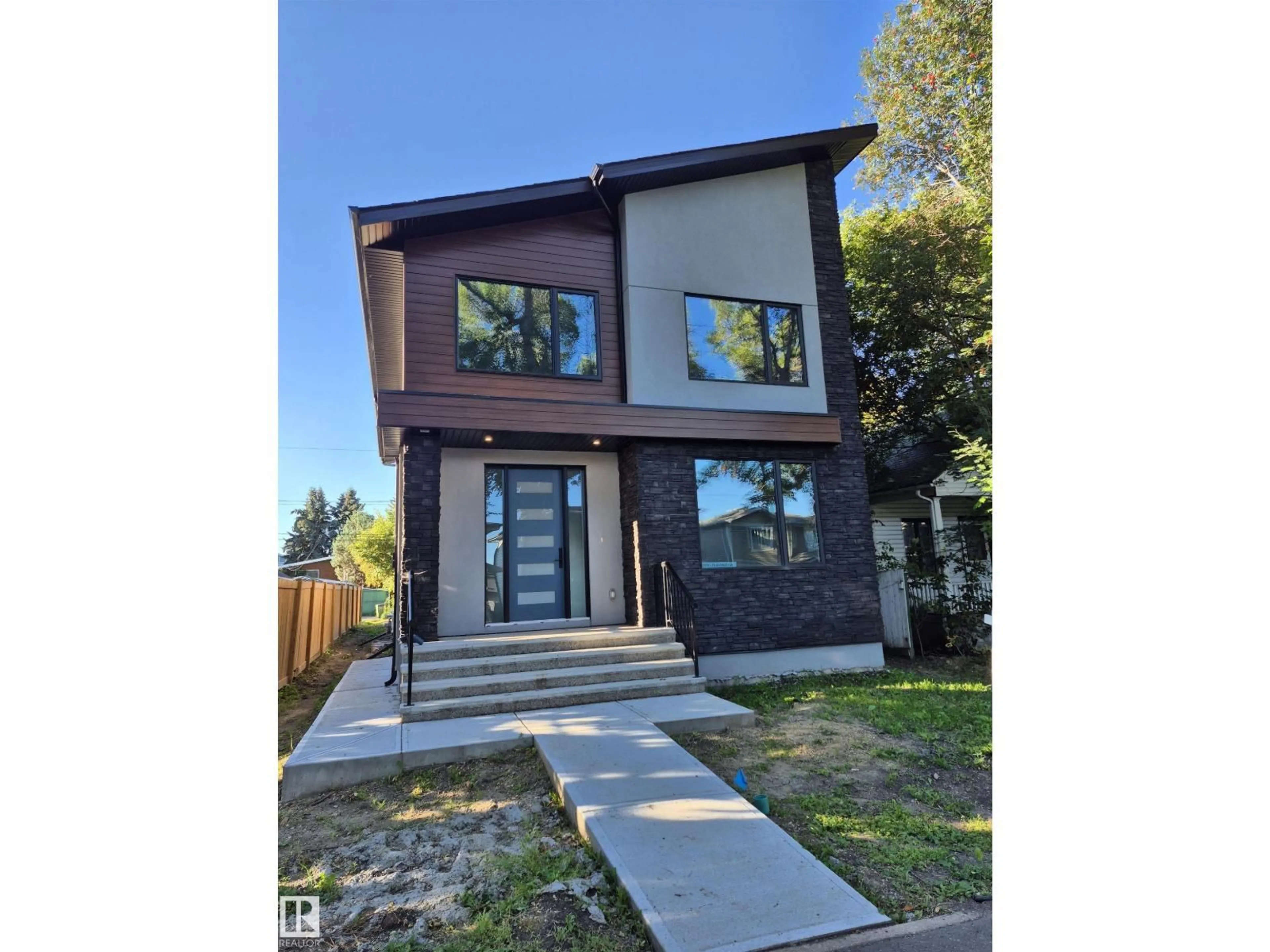 Home with brick exterior material, street for 9515 75 AV, Edmonton Alberta T6E1H5