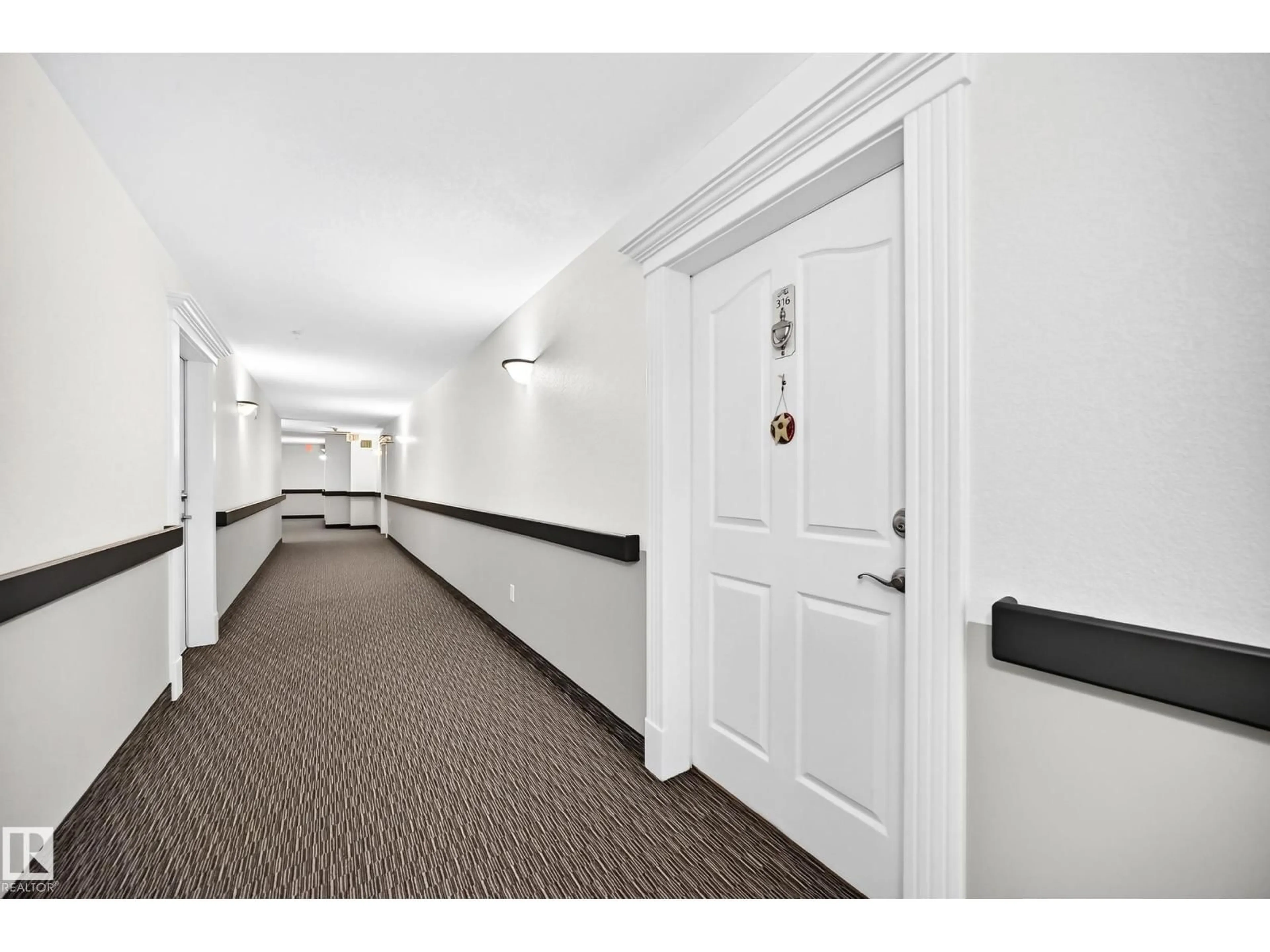 Indoor foyer for 9008 - 316 99 AV, Edmonton Alberta T5H4M6